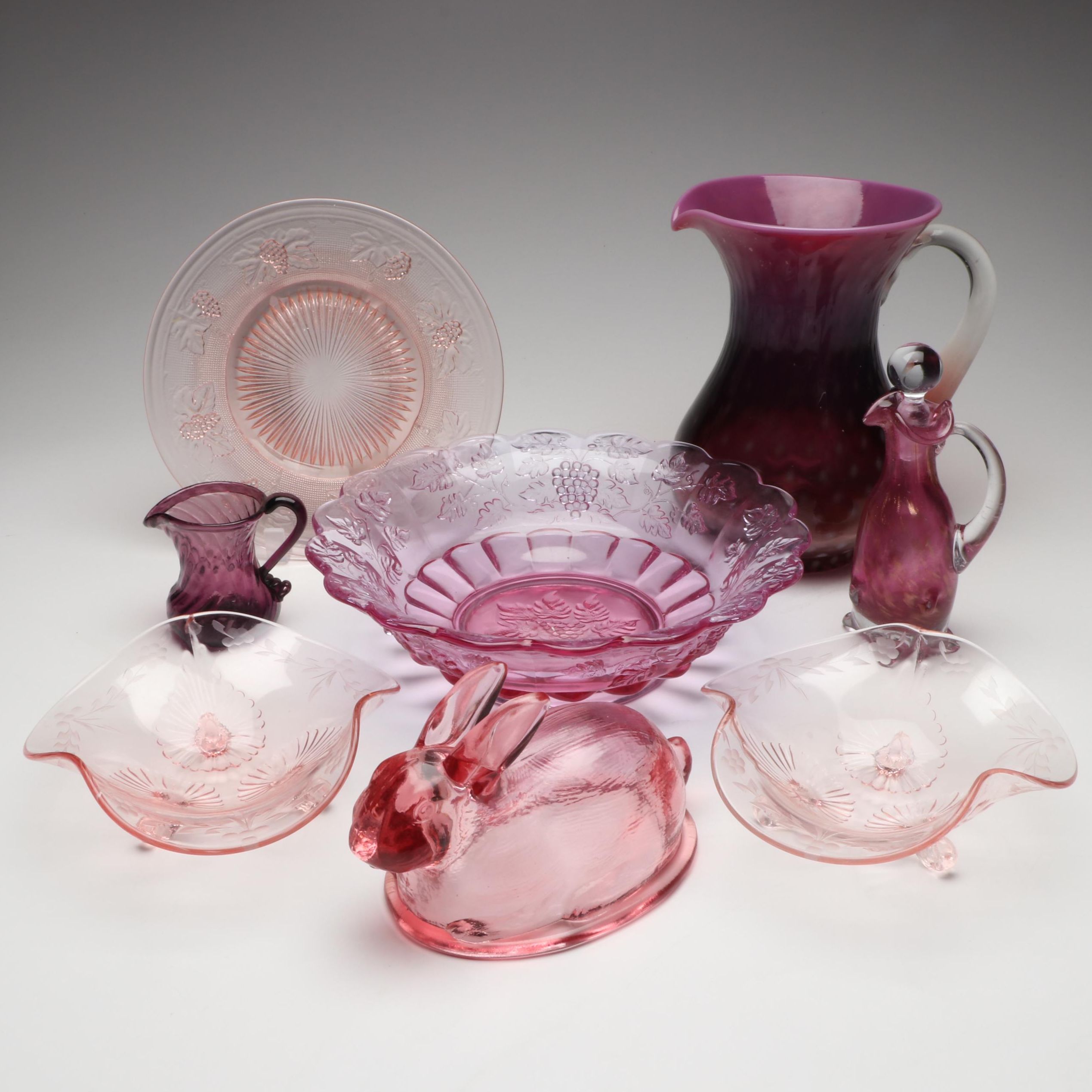 Pink and Amethyst Blown Glass Pitchers and Cruet with EAPG Plate and Bowls