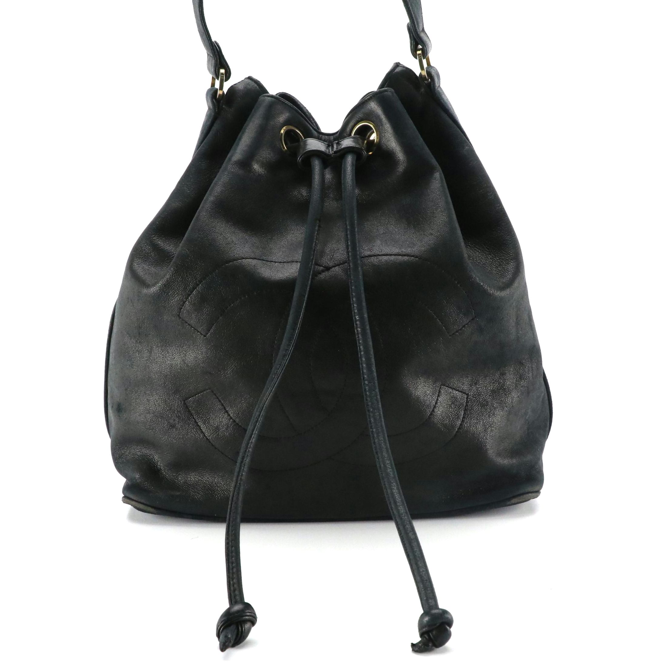 Chanel CC Stitched Drawstring Bucket Bag in Navy Lambskin Leather with Zip Pouch