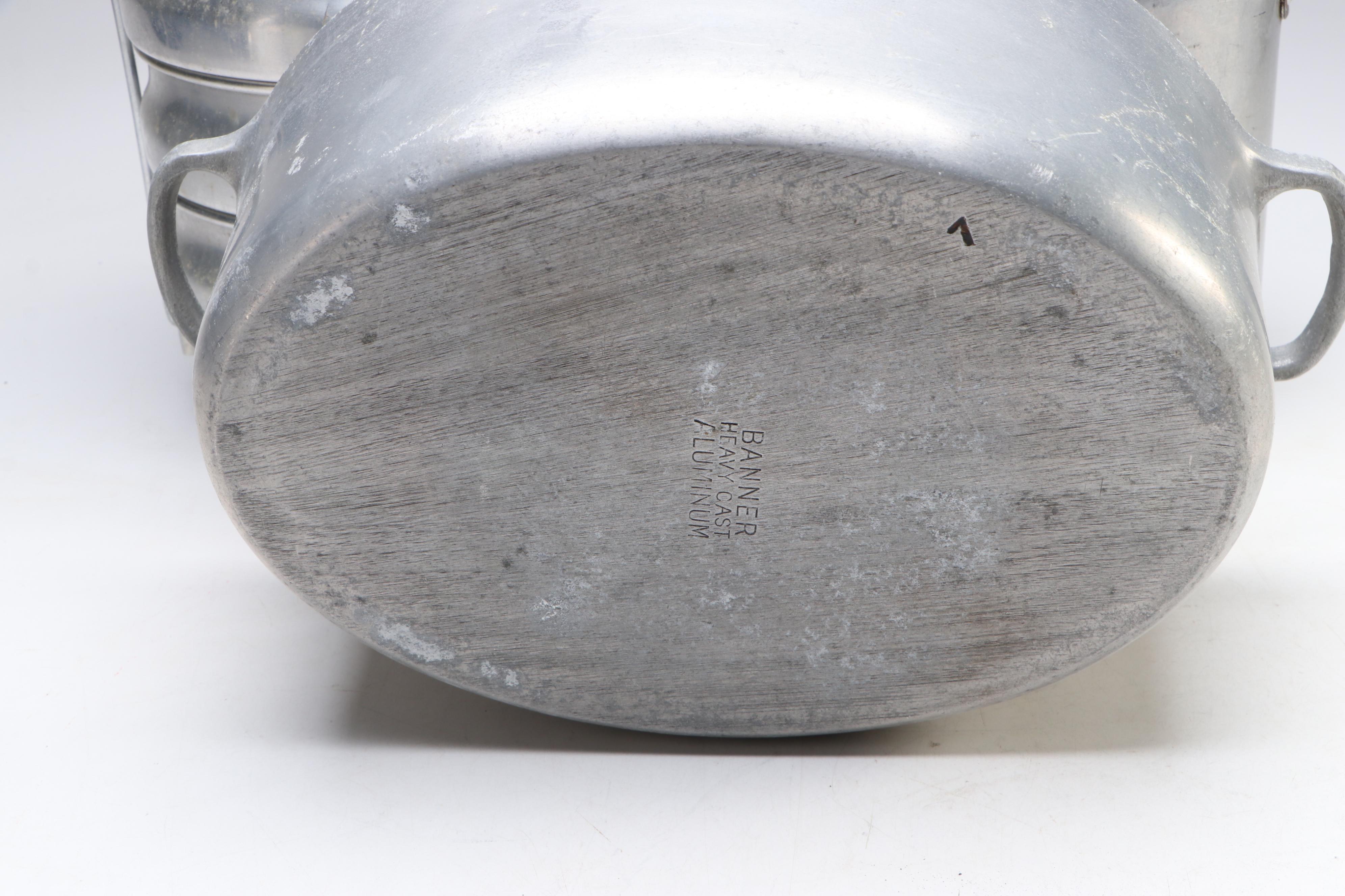 Banner Dutch Oven with Comet Kettle and Other Aluminum Vessels