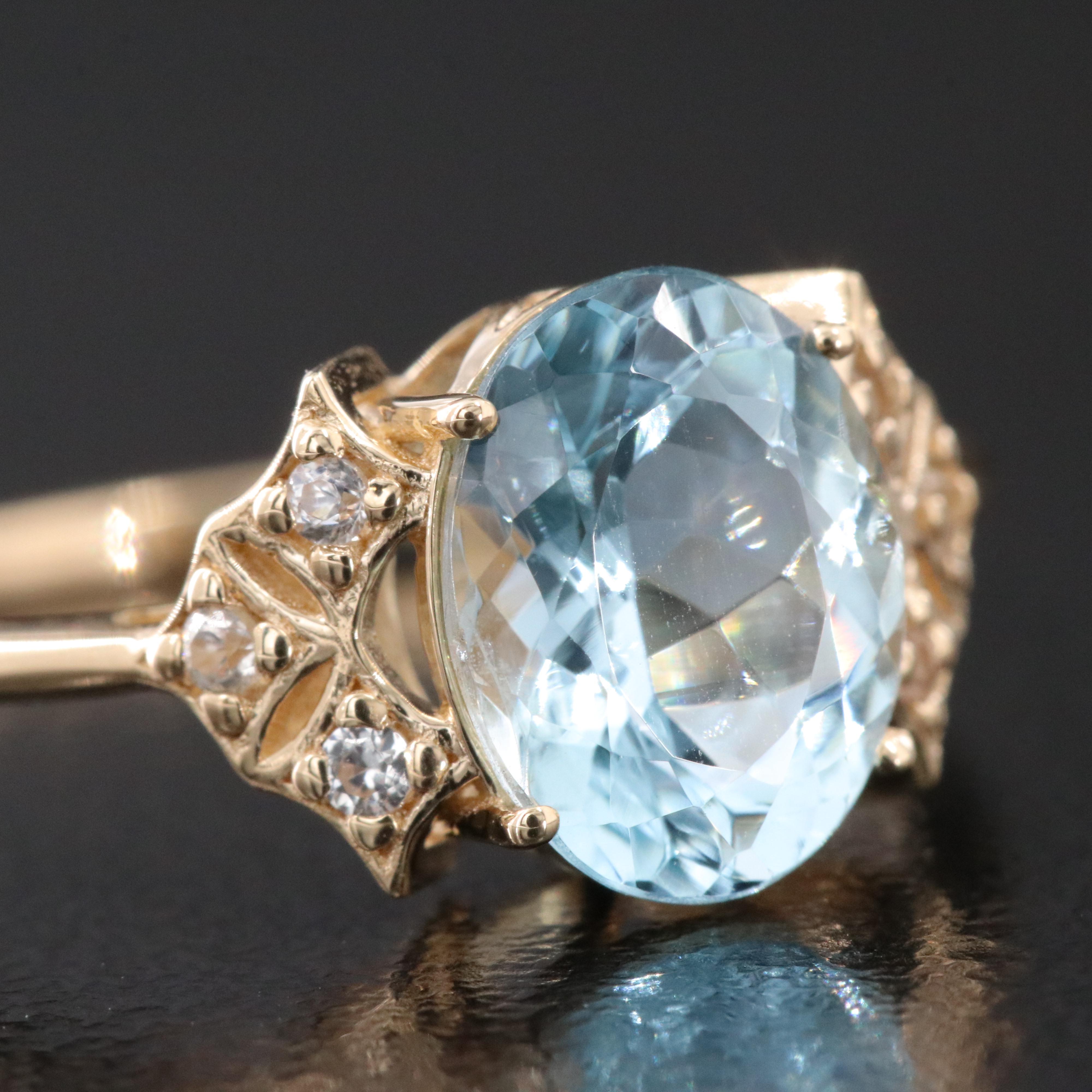 14K Aquamarine and White Sapphire Ring