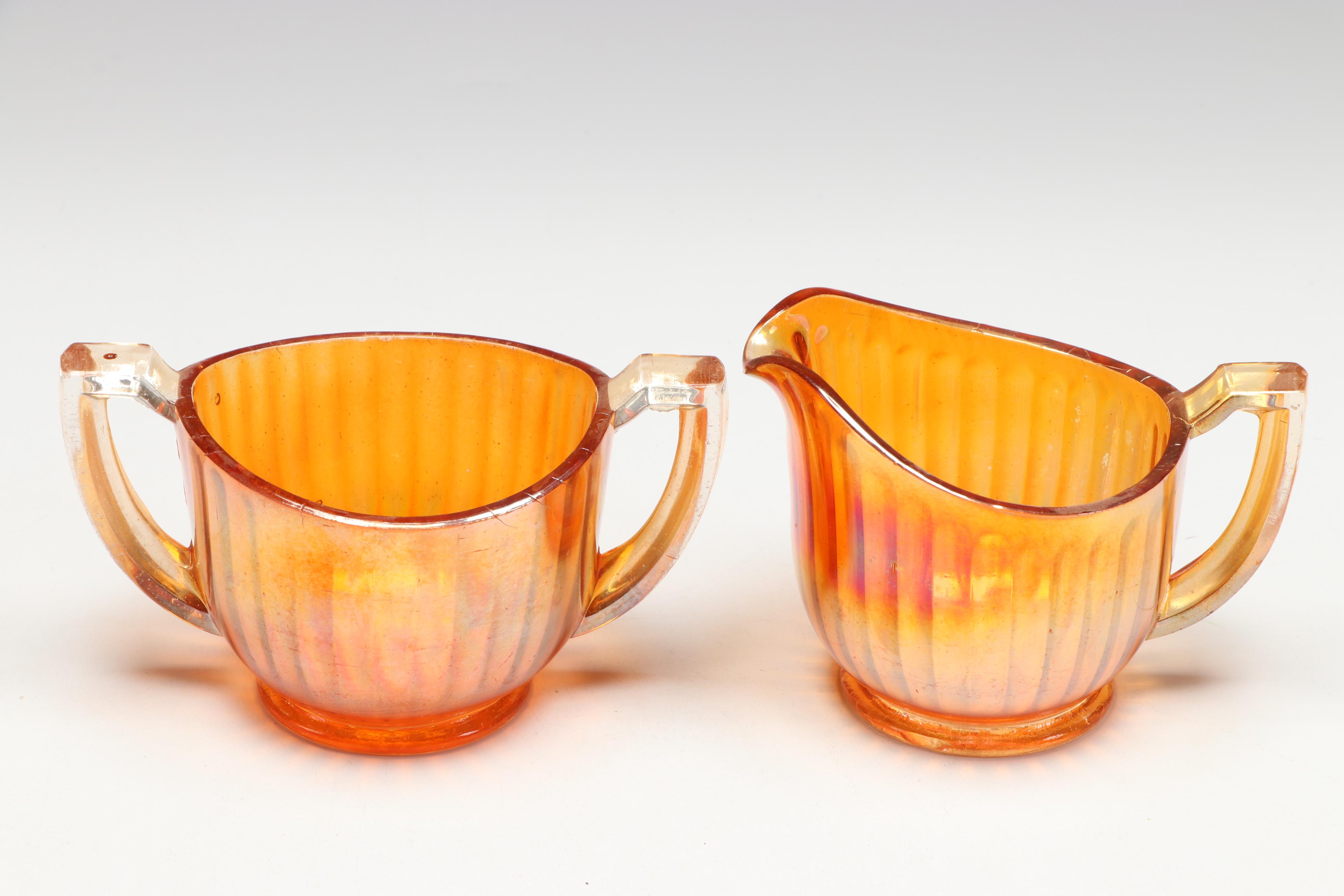 Carnival Glass Footed Bowls, Creamer and Sugar, and Candle Holders
