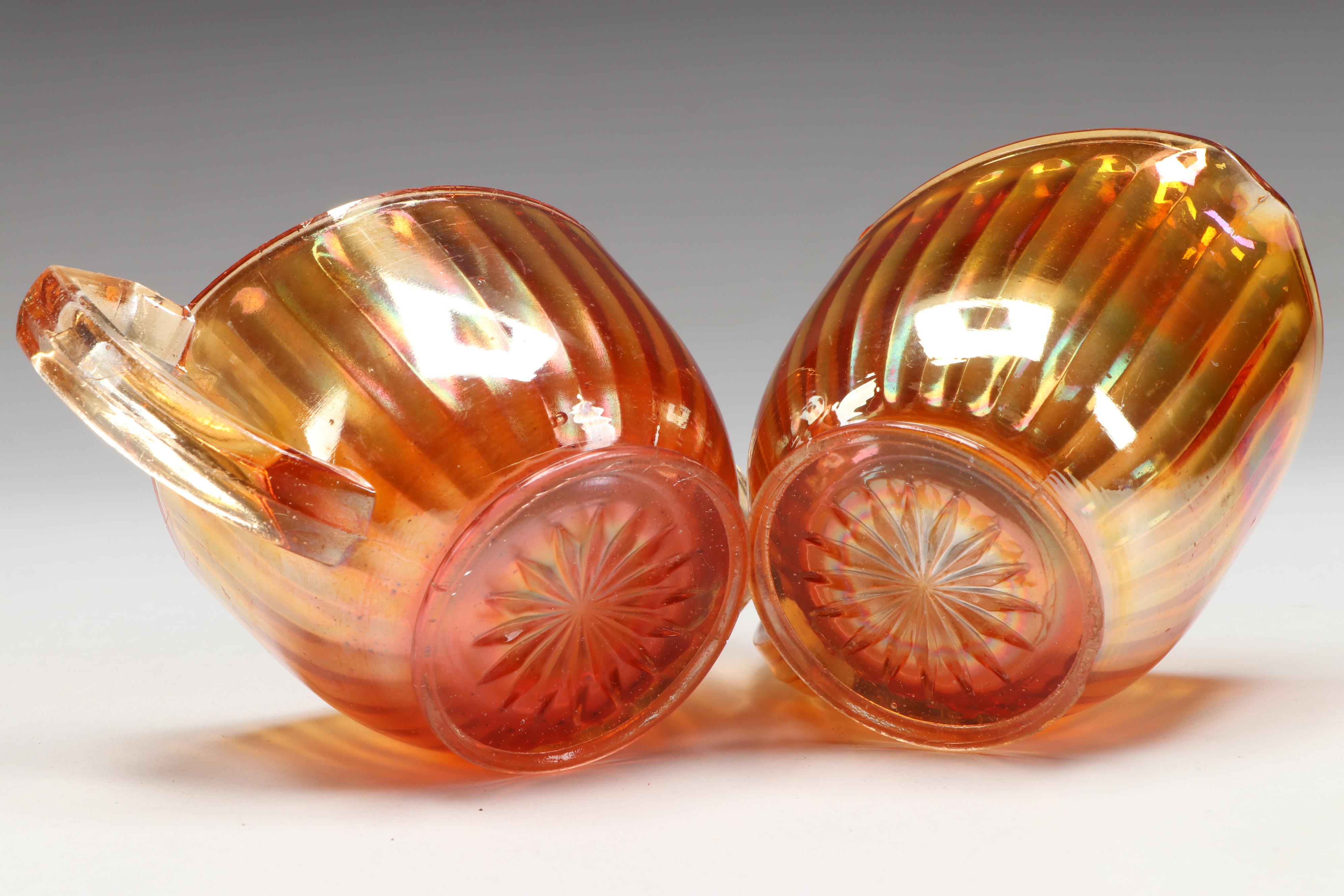 Carnival Glass Footed Bowls, Creamer and Sugar, and Candle Holders