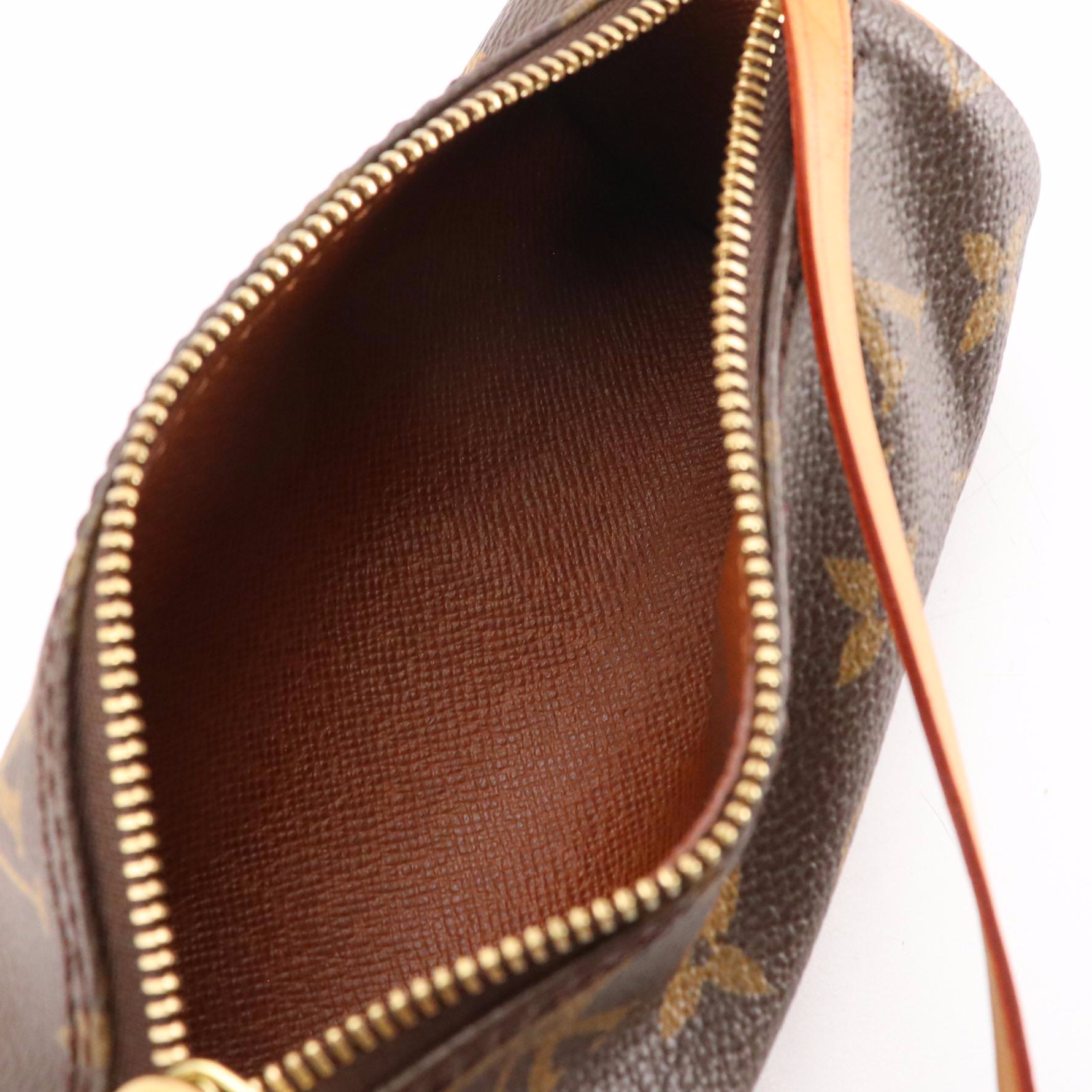 Louis Vuitton Papillon Pochette in Monogram Canvas and Vachetta Leather