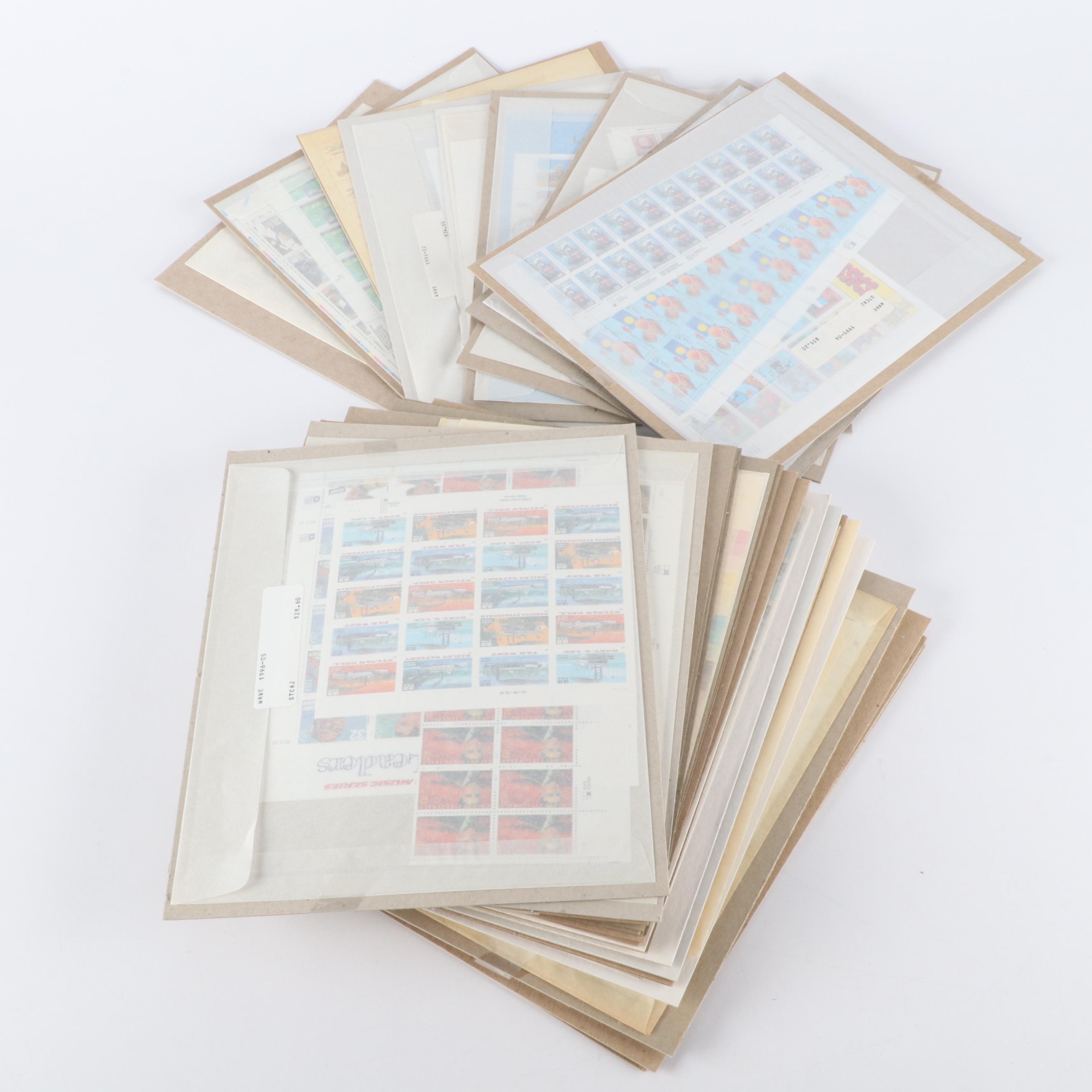Over 100 Mint Condition U.S. Postage Stamp Sheets, Panes, and Souvenir Sheets