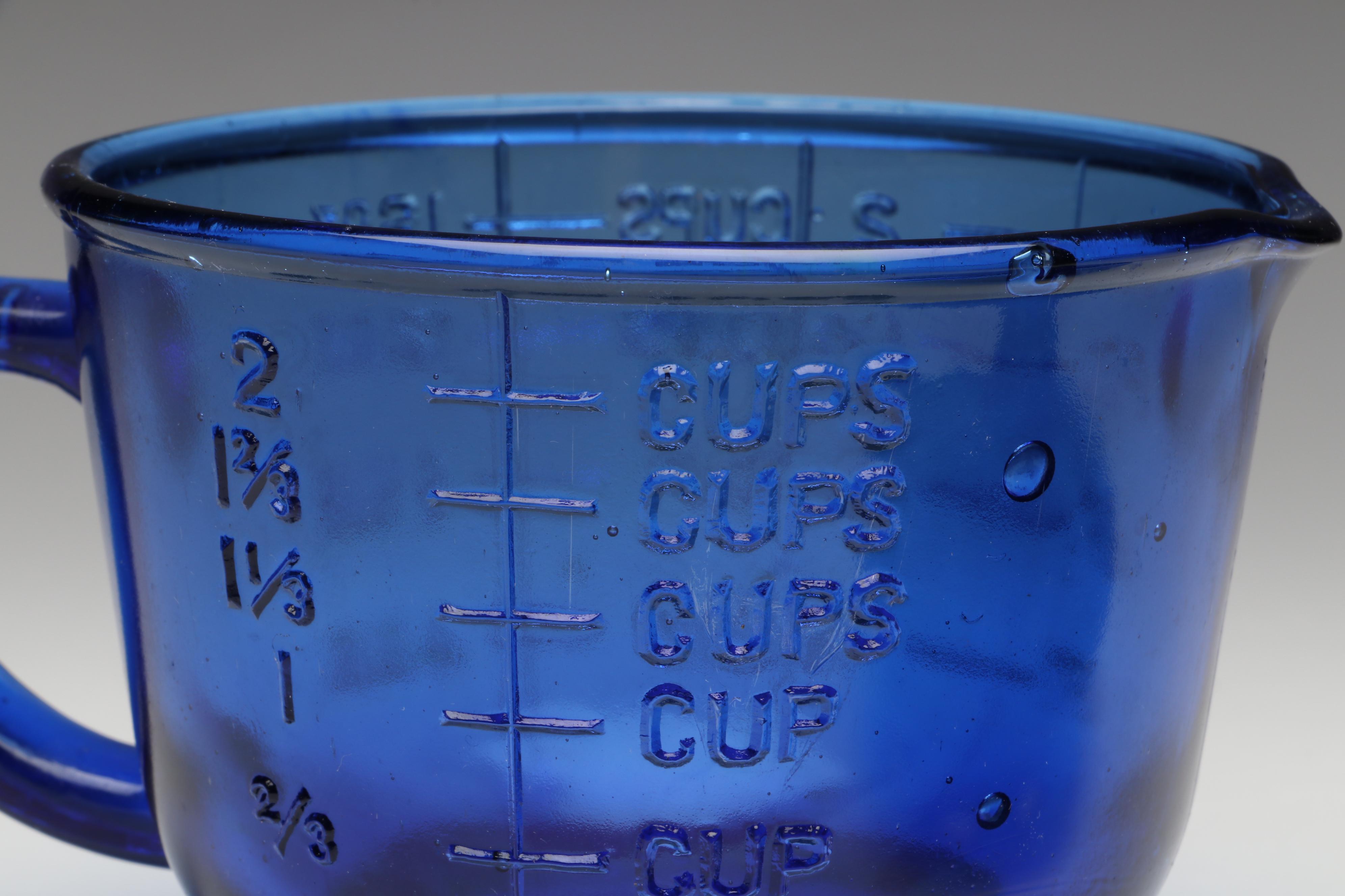 Hazel Atlas Cobalt Measuring Cup with Gibson Cruet and Other Table Accessories