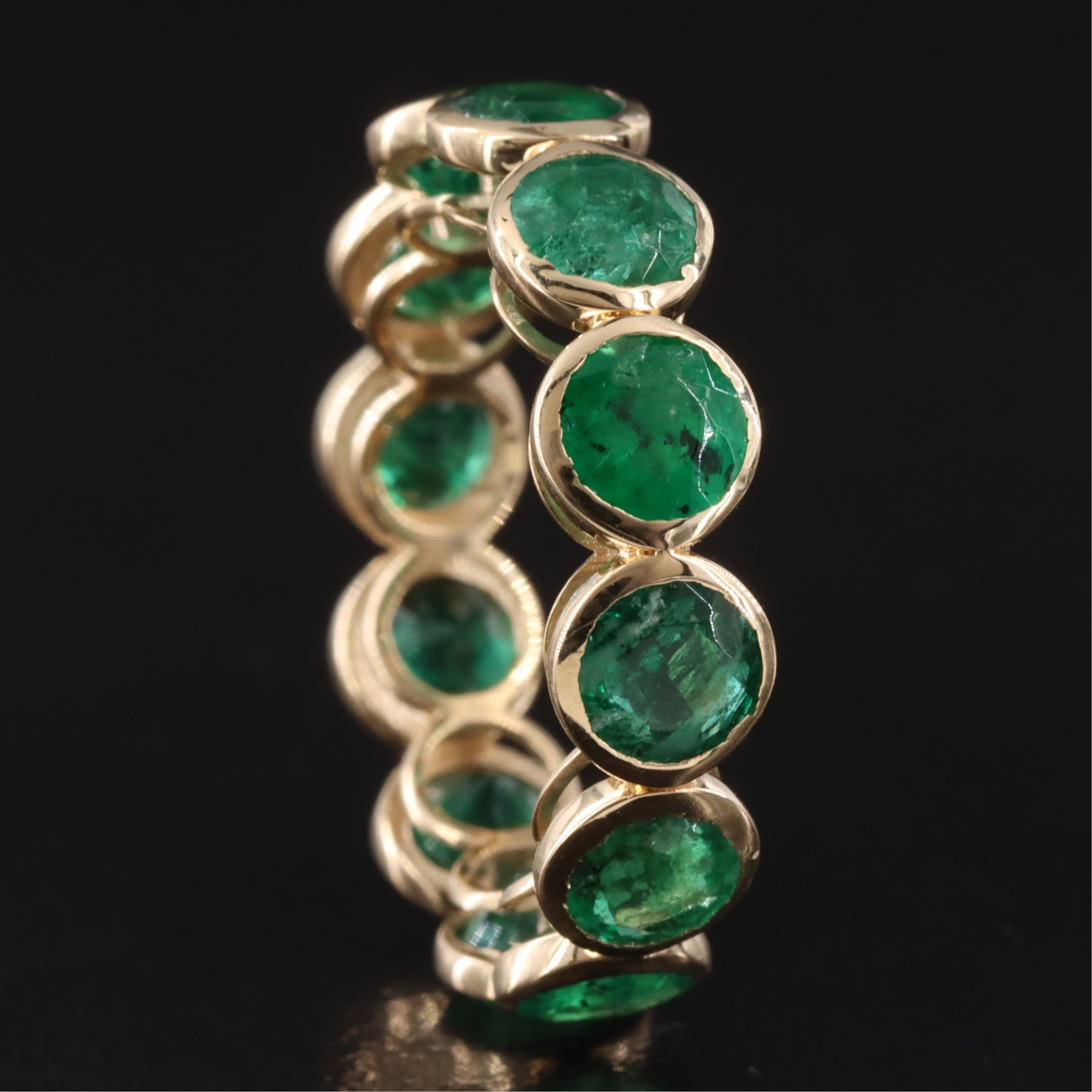 18K 5.41 CTW Emerald Eternity Band