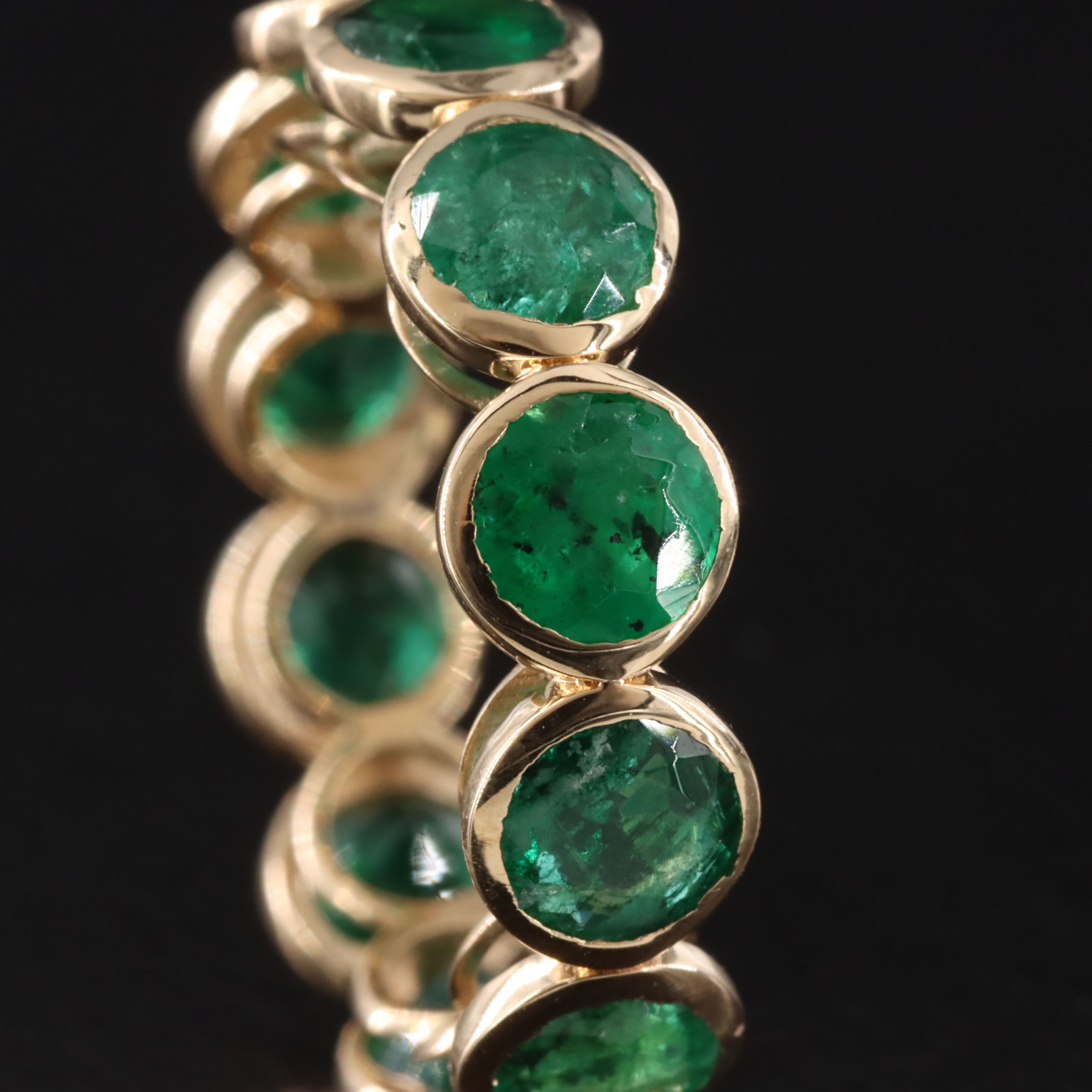 18K 5.41 CTW Emerald Eternity Band