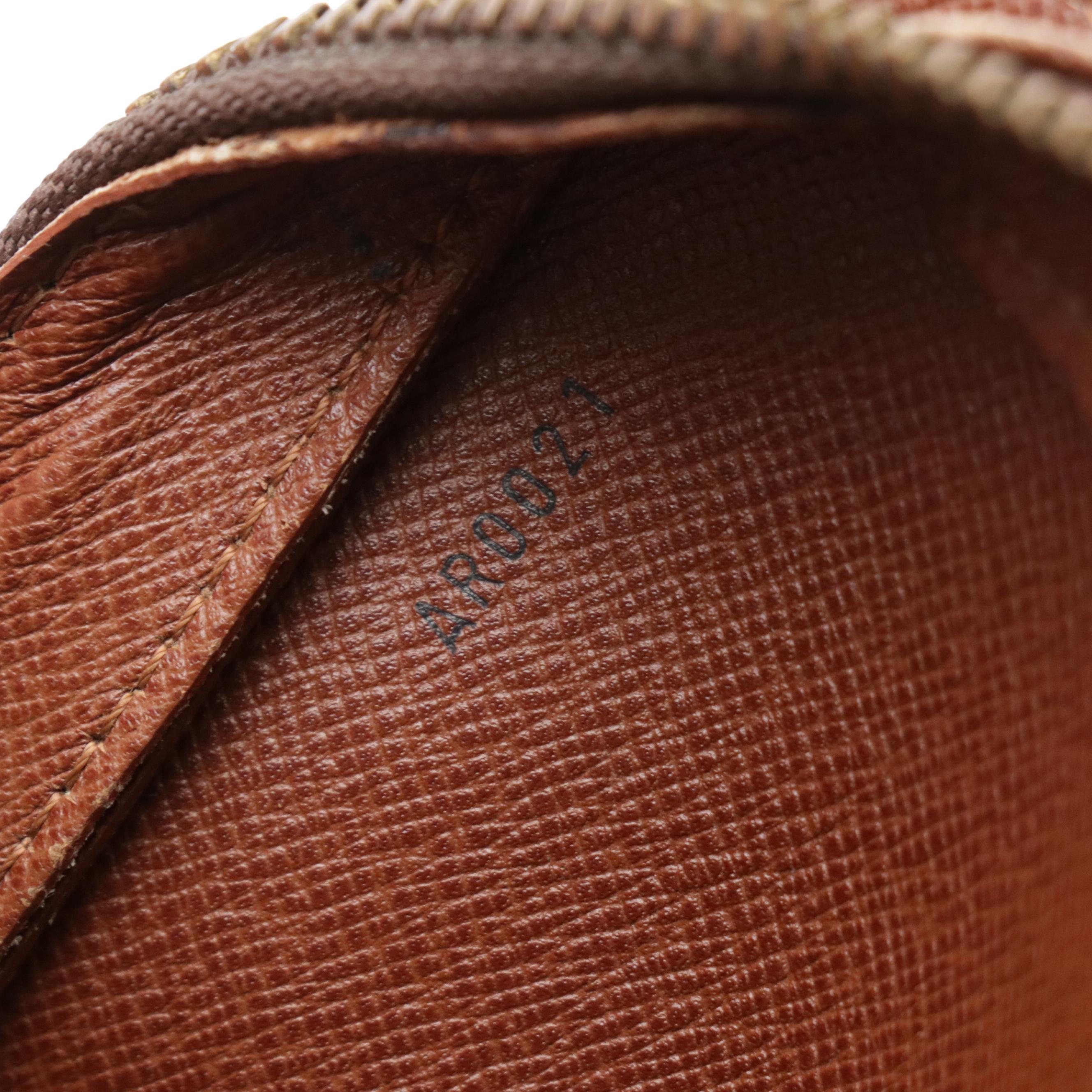 Louis Vuitton Pochette Orsay Wristlet in Monogram Canvas with Leather Trim