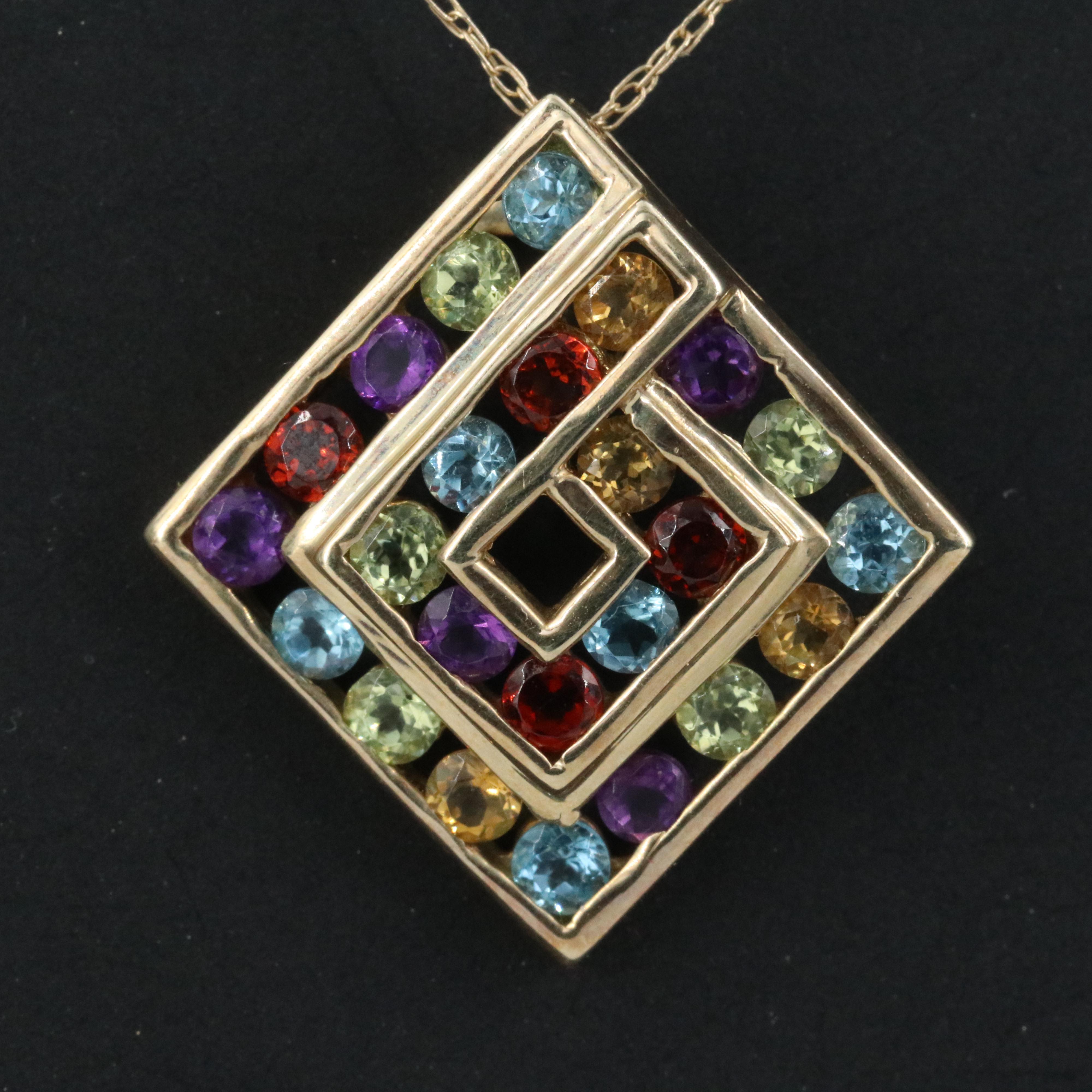 10K Gemstone Pendant Necklace Feeaturing Amethyst, Blue Topaz and Garnet