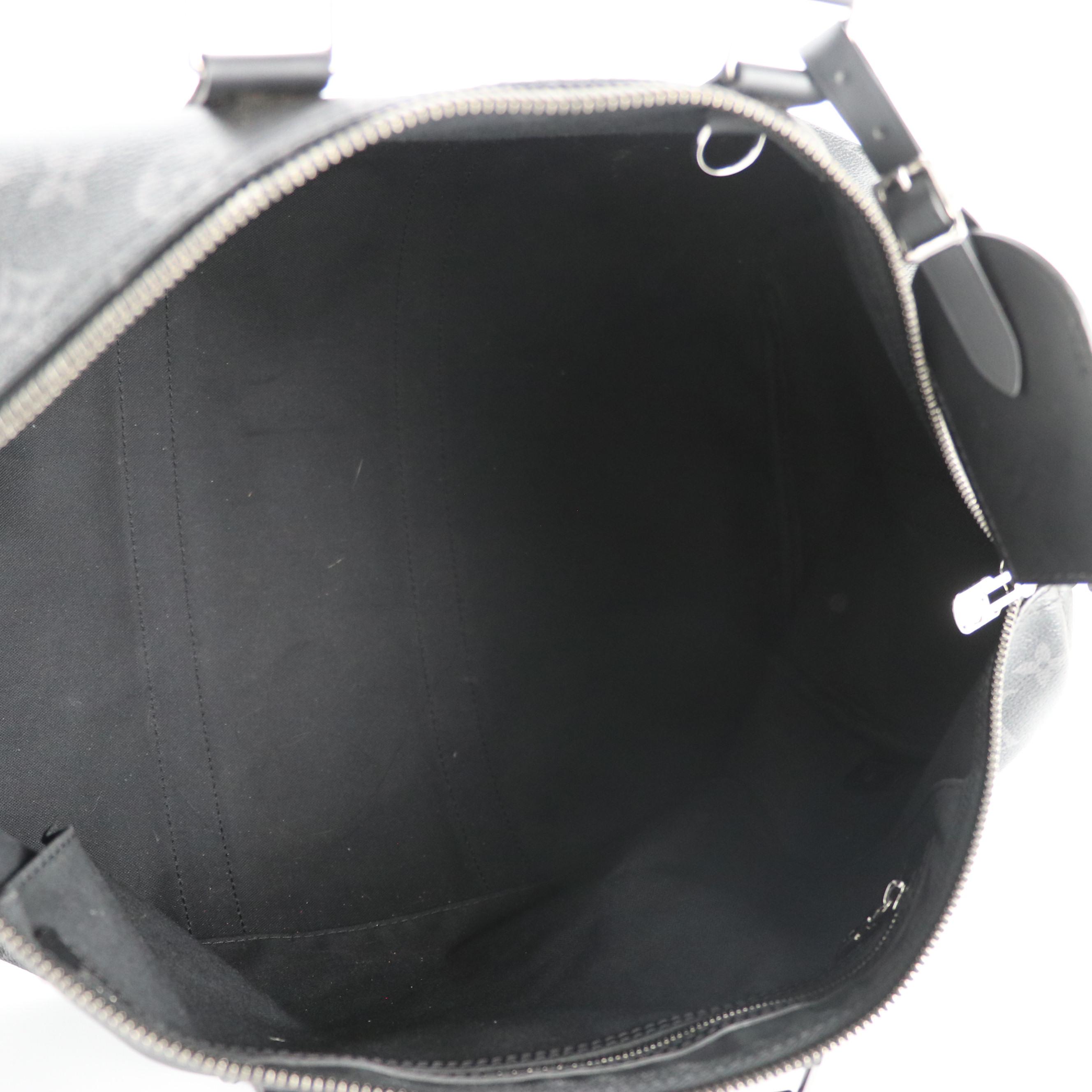 Louis Vuitton Keepall Bandoulière 45 in Monogram Eclipse and Black Leather