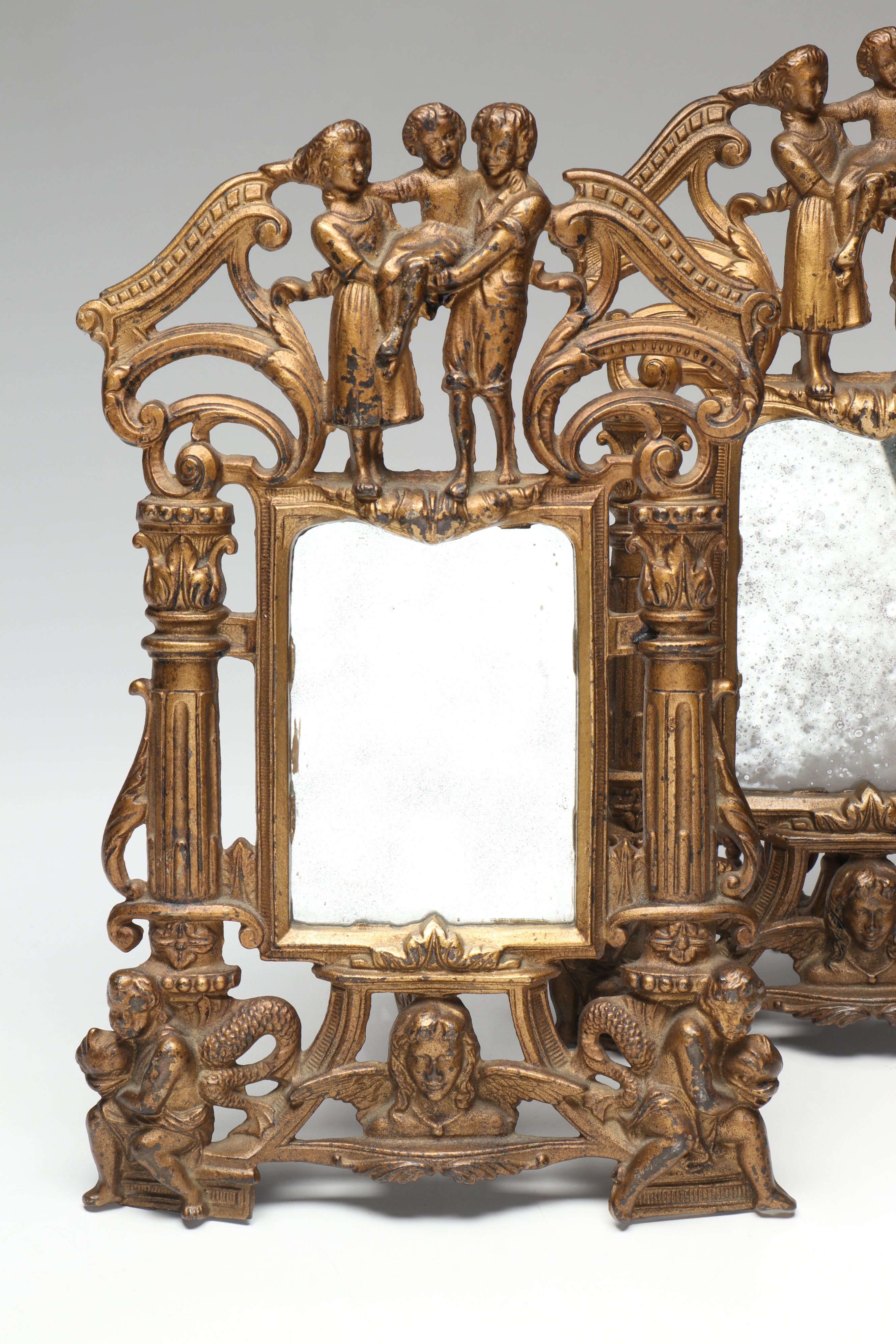 Brass Figural Framed Mirror Pair