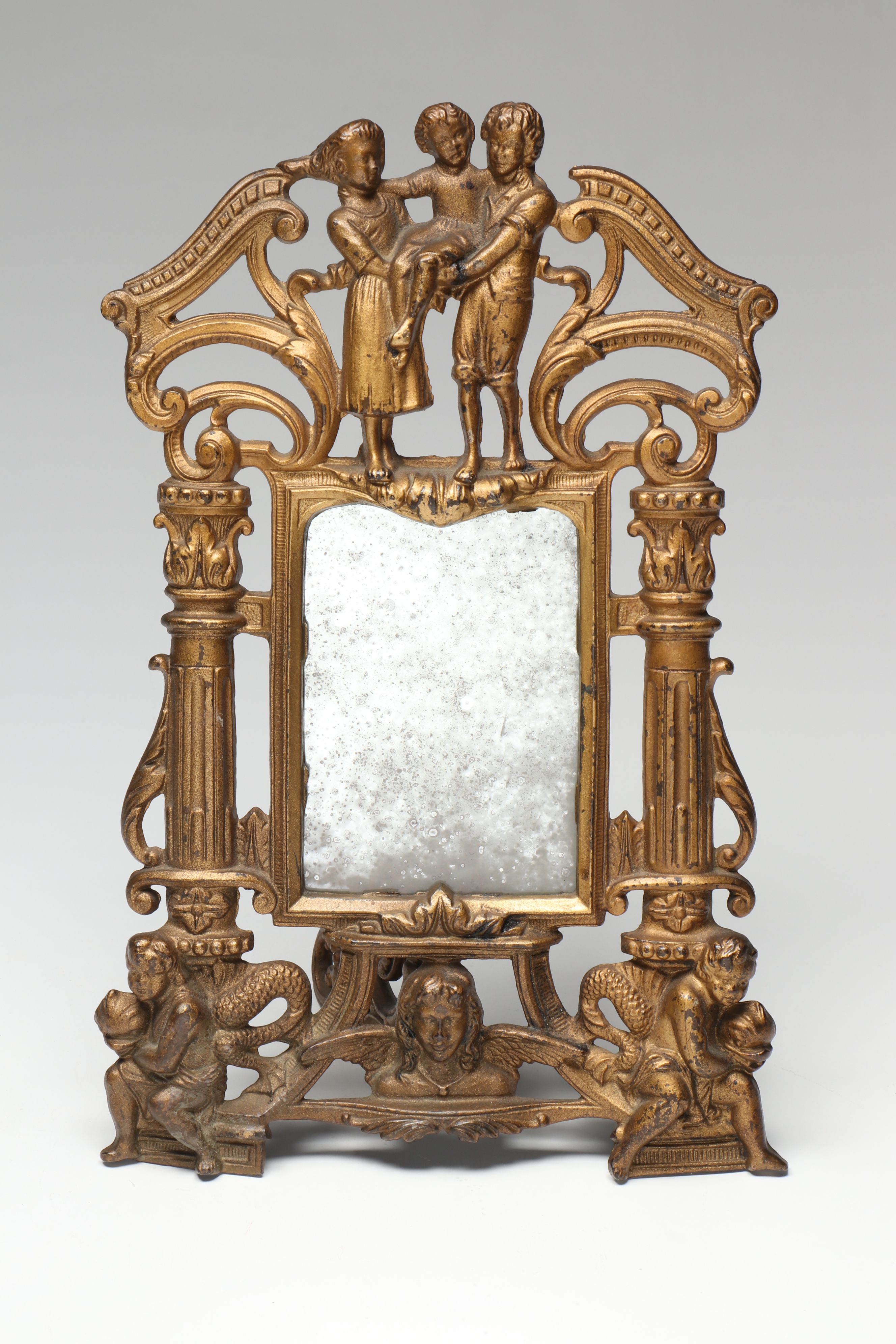 Brass Figural Framed Mirror Pair