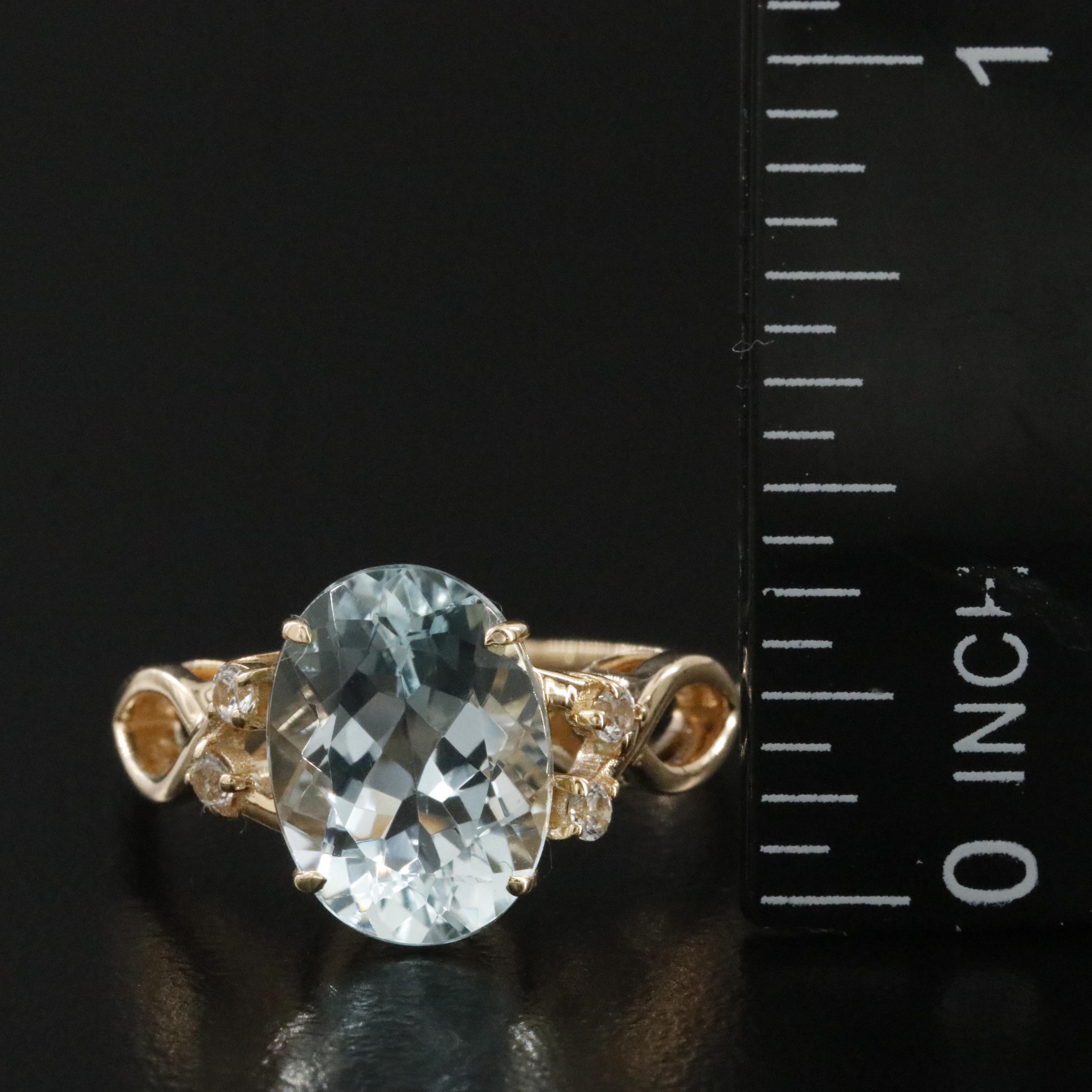 14K Aquamarine and White Sapphire Ring