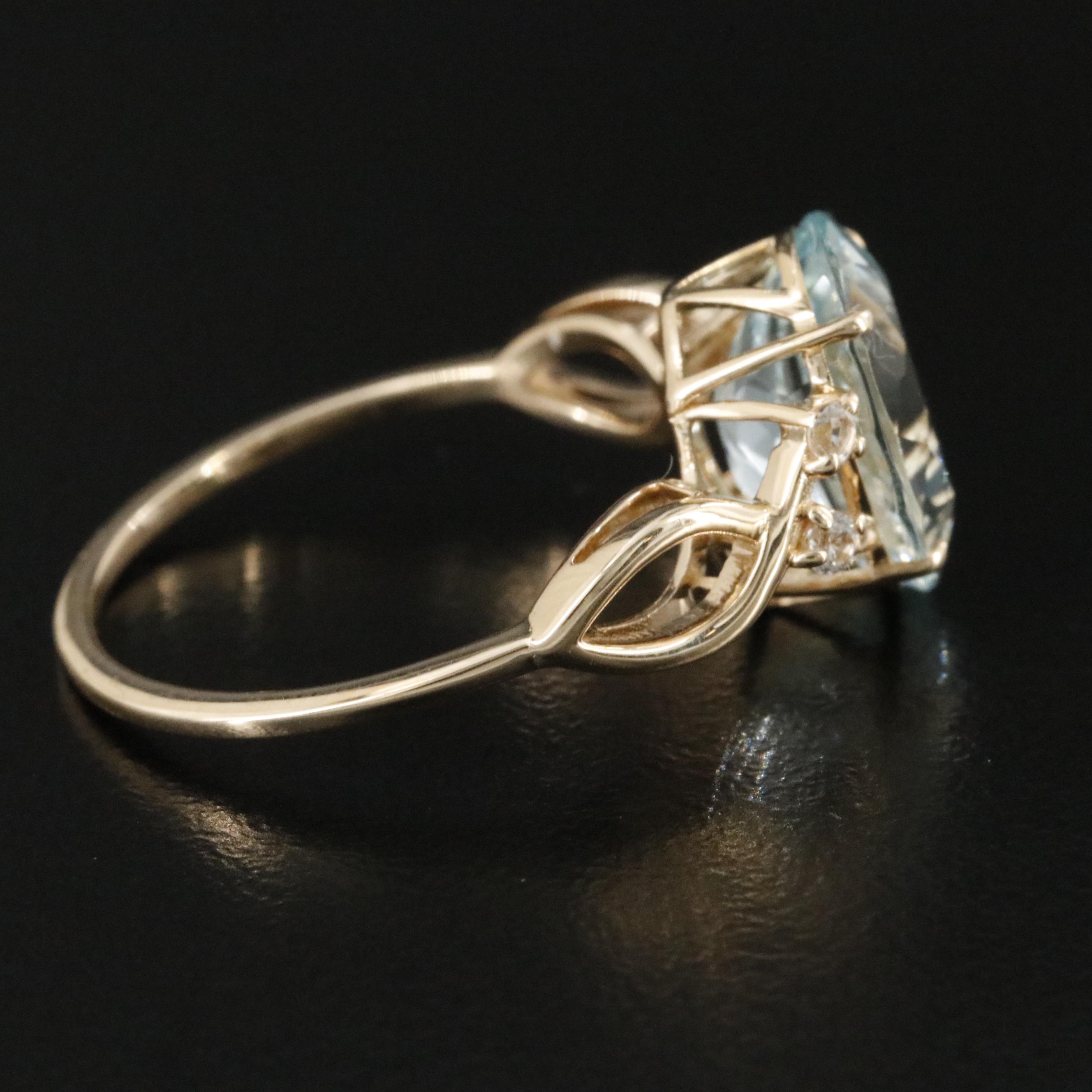 14K Aquamarine and White Sapphire Ring