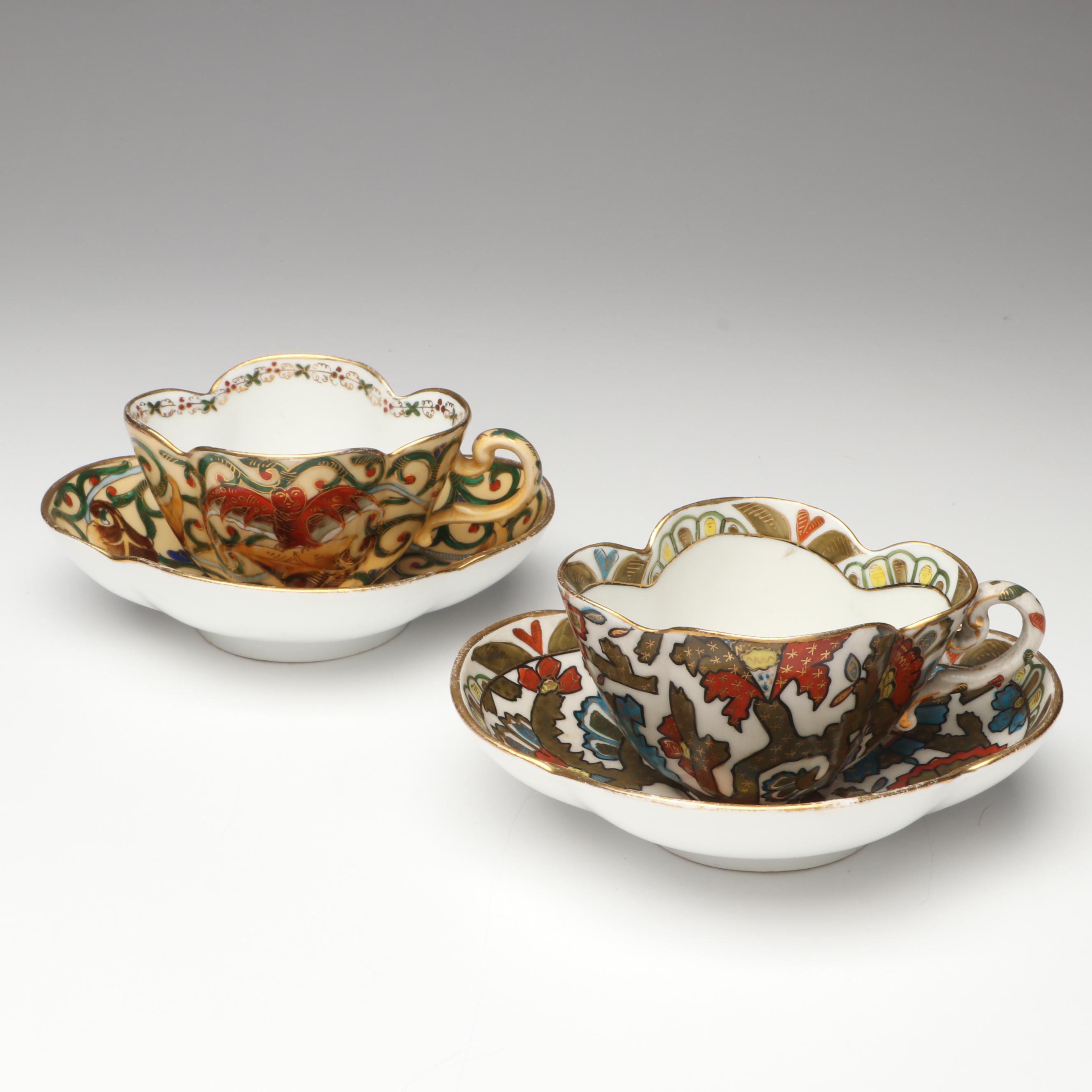 Continental Gilt Porcelain Teacups with Saucers
