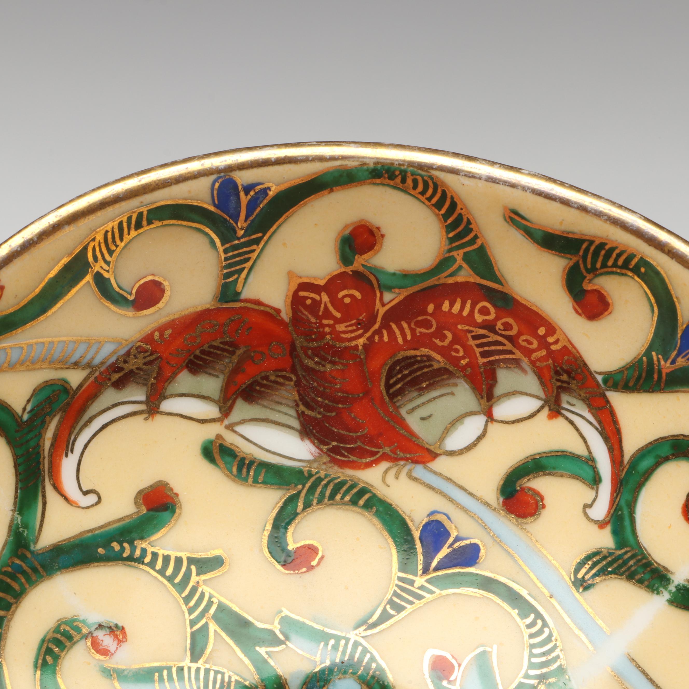 Continental Gilt Porcelain Teacups with Saucers