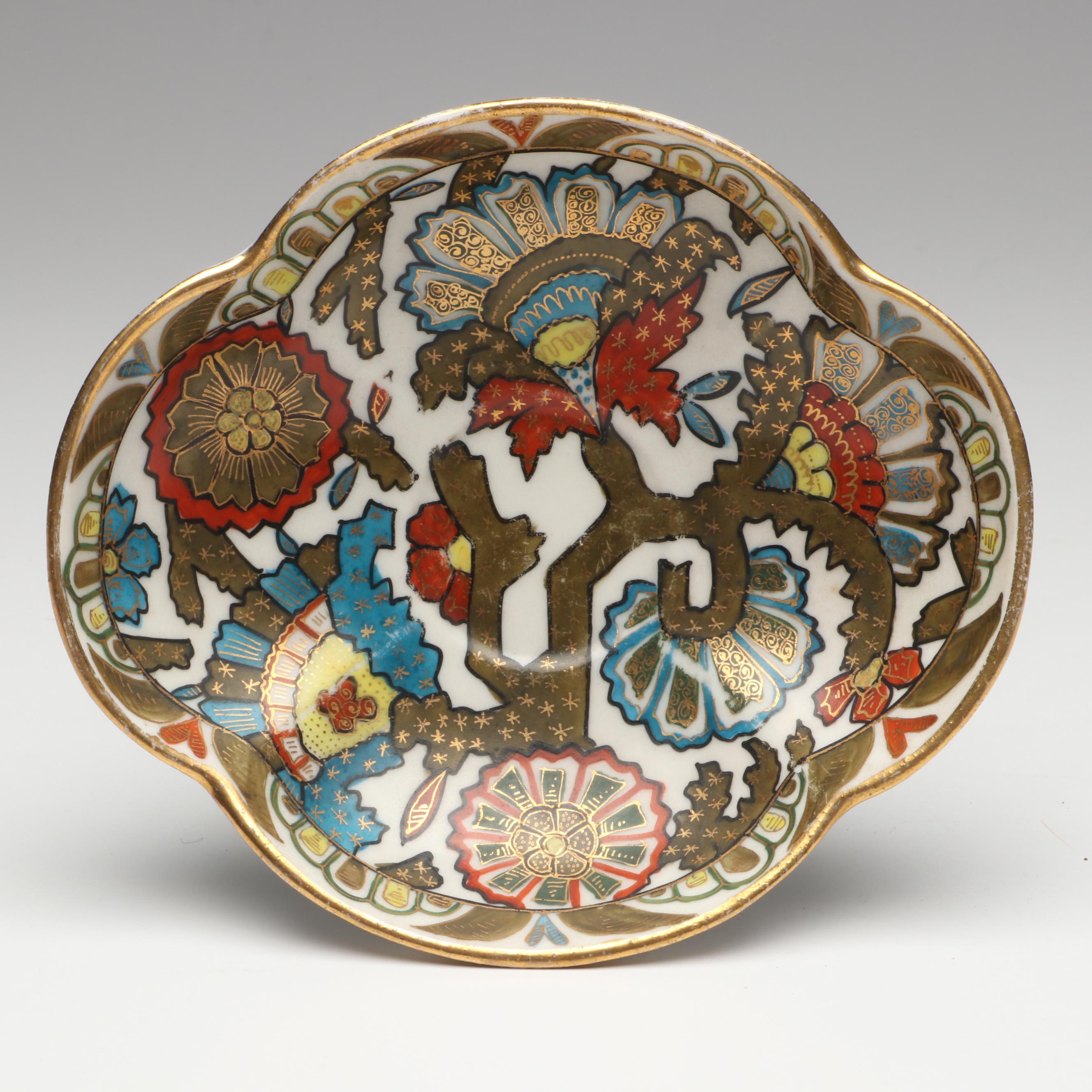 Continental Gilt Porcelain Teacups with Saucers