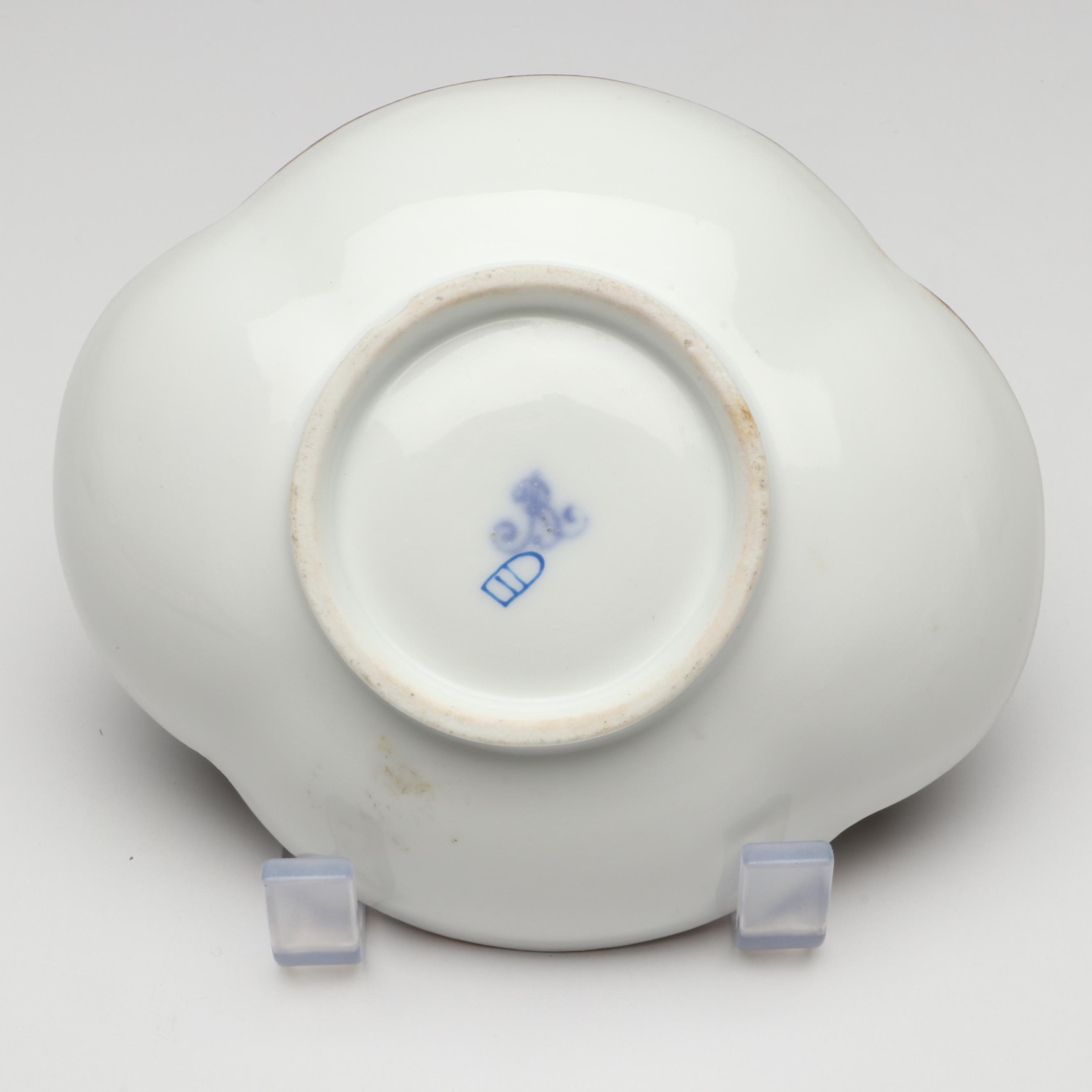 Continental Gilt Porcelain Teacups with Saucers