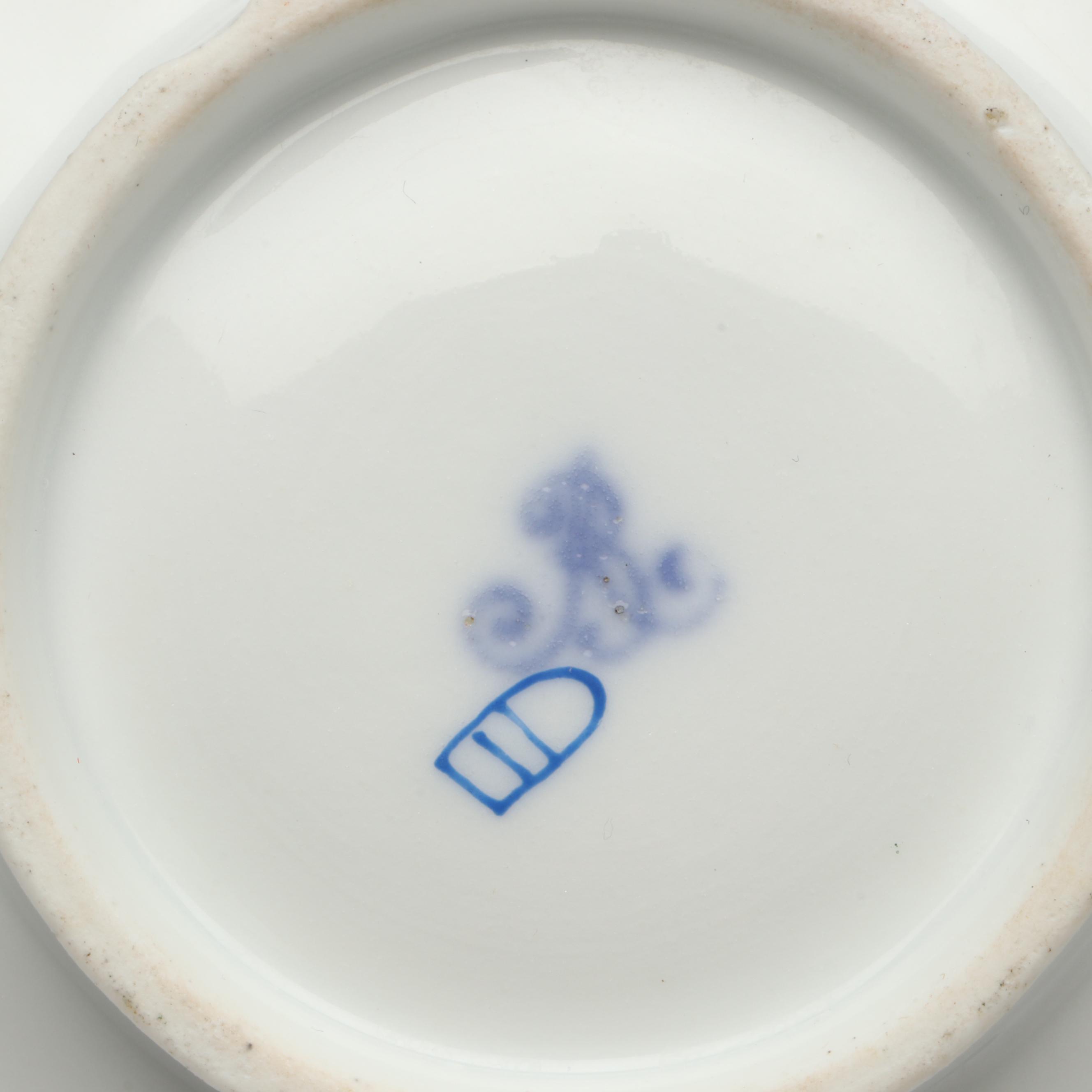 Continental Gilt Porcelain Teacups with Saucers