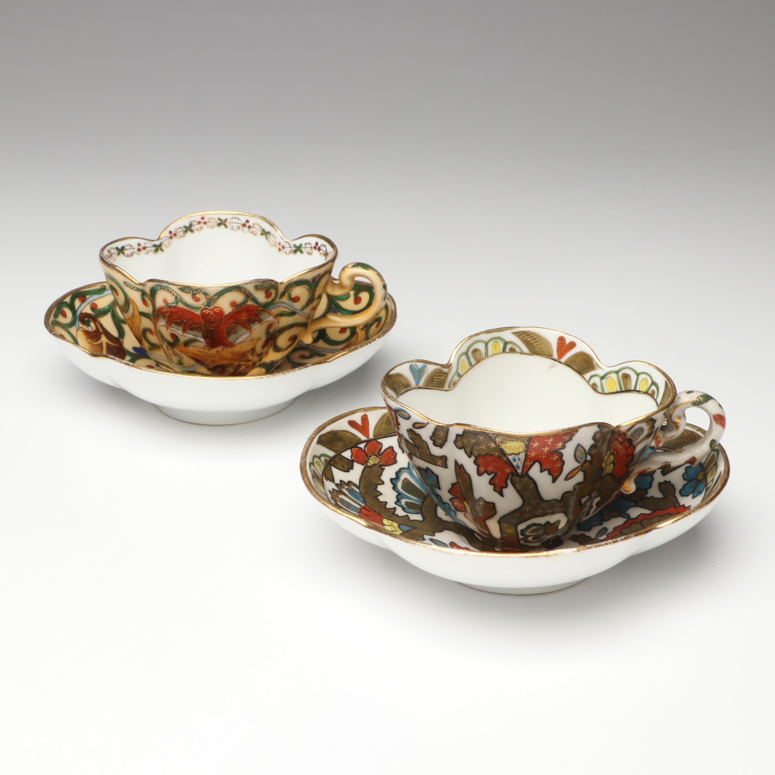 Continental Gilt Porcelain Teacups with Saucers