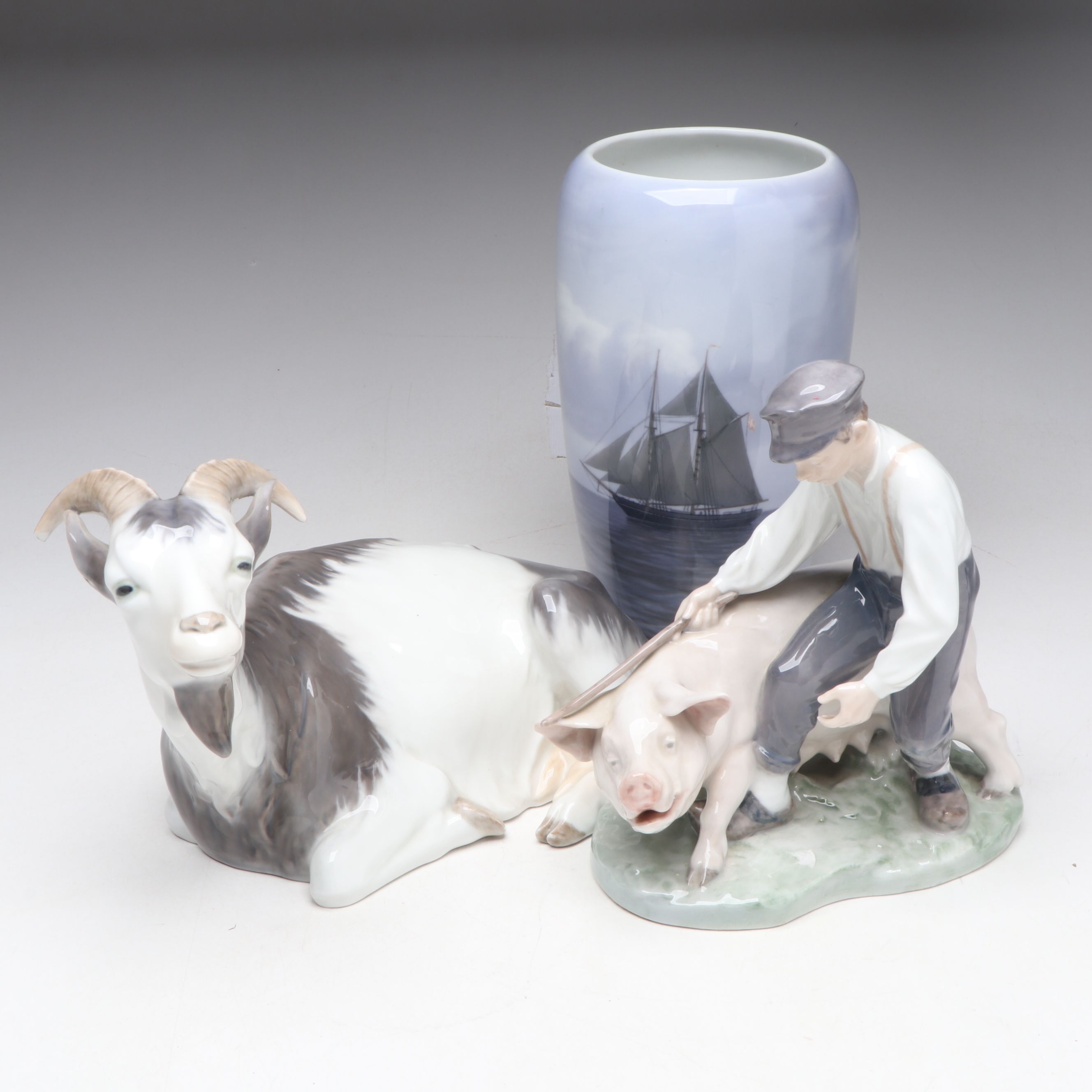 Royal Copenhagen "Goat" and "Boy with Pig" Figurines with Seascape Vase