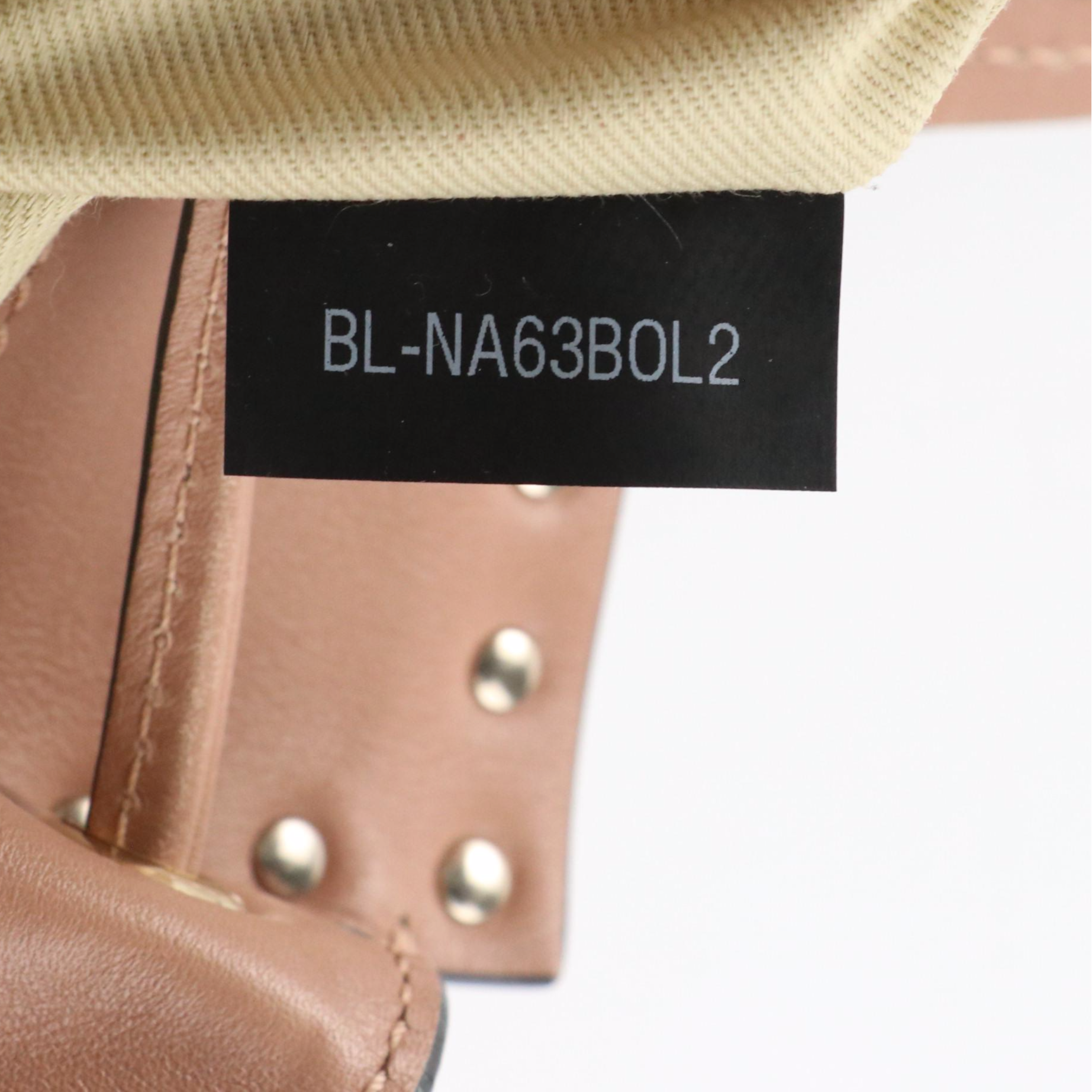 Valentino Garavani Rockstud Drawstring Tote in Beige Calfskin Leather