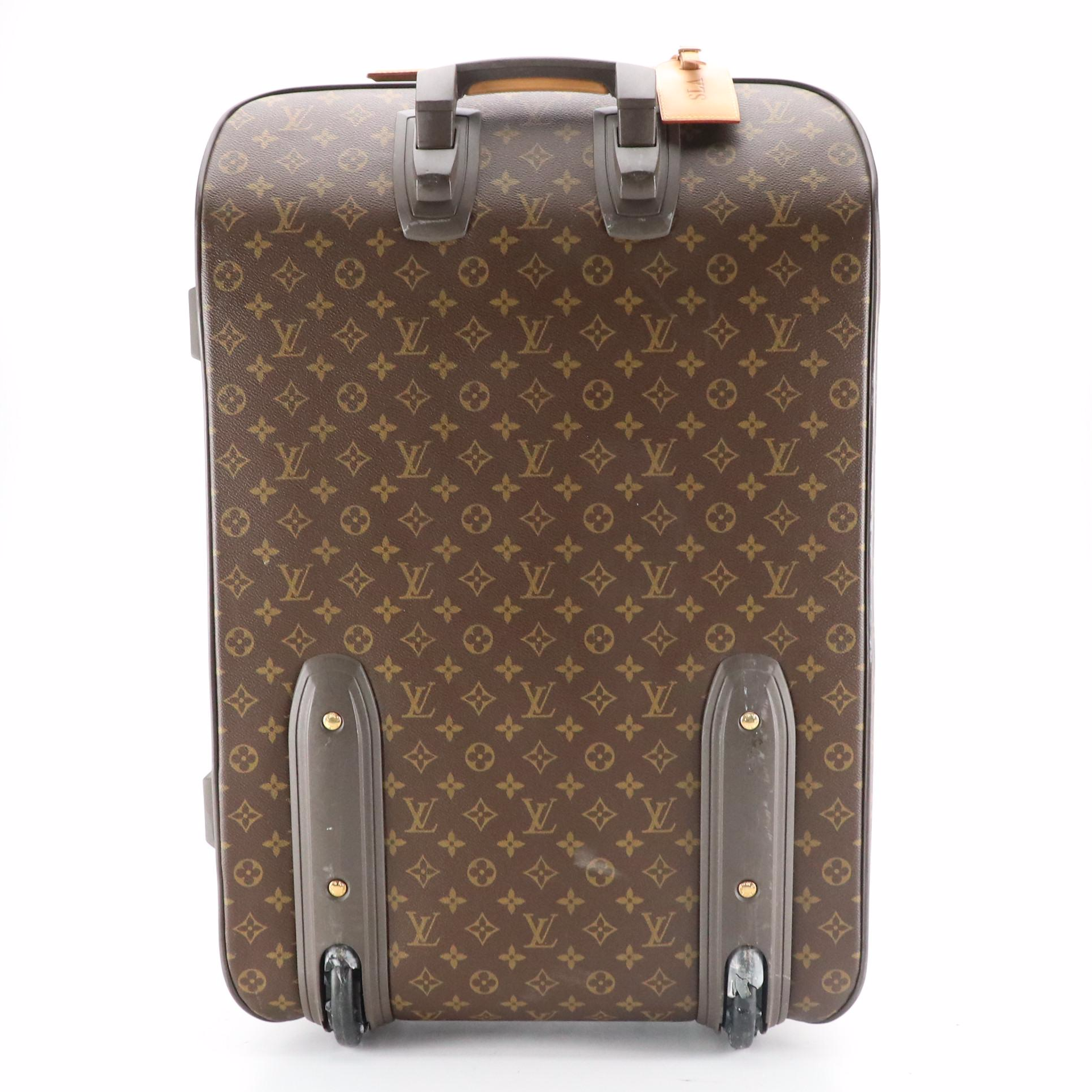 Louis Vuitton Pégase 65 Rolling Suitcase in Monogram Canvas and Leather