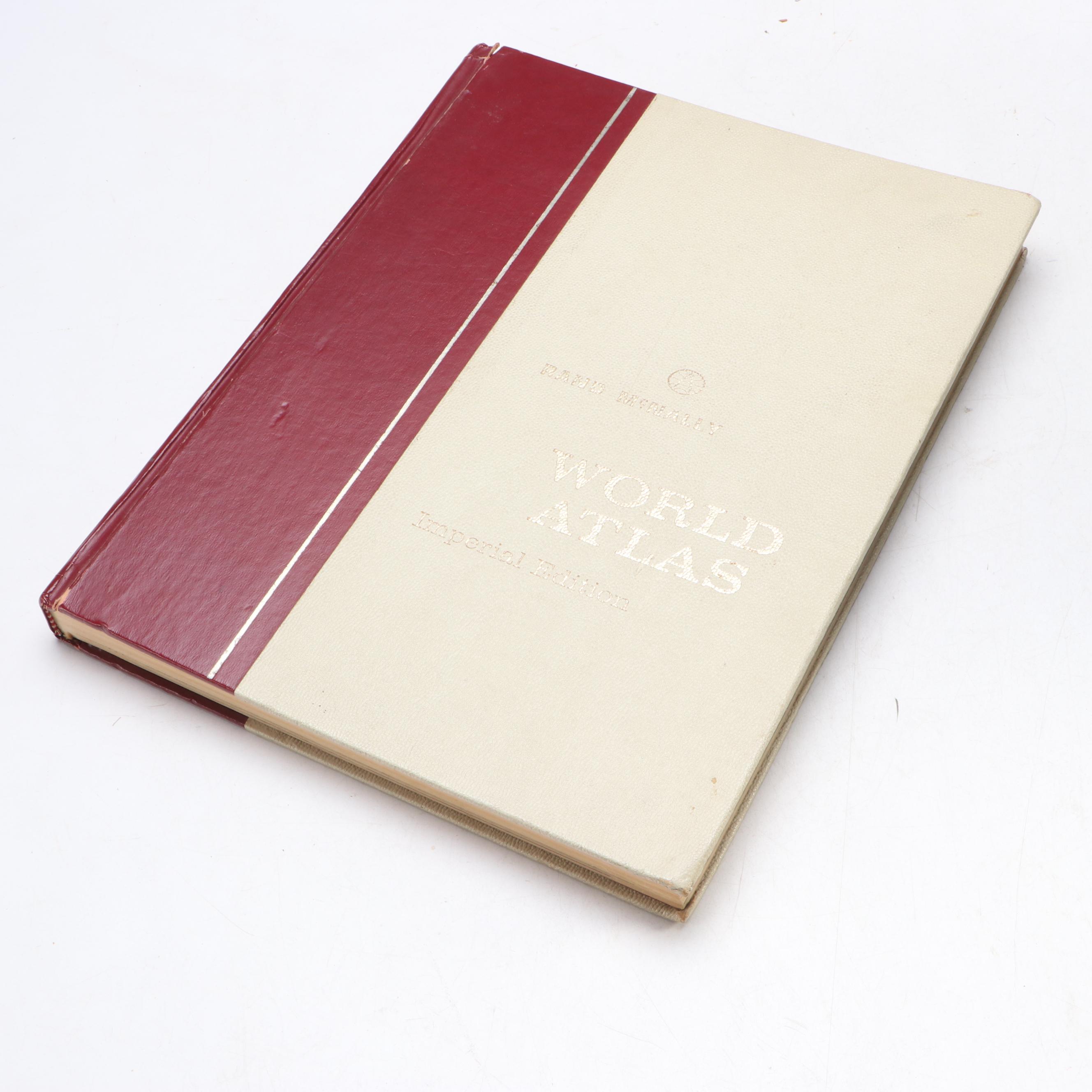 "Webster's New Twentieth Century Dictionary" with "Rand McNally World Atlas"