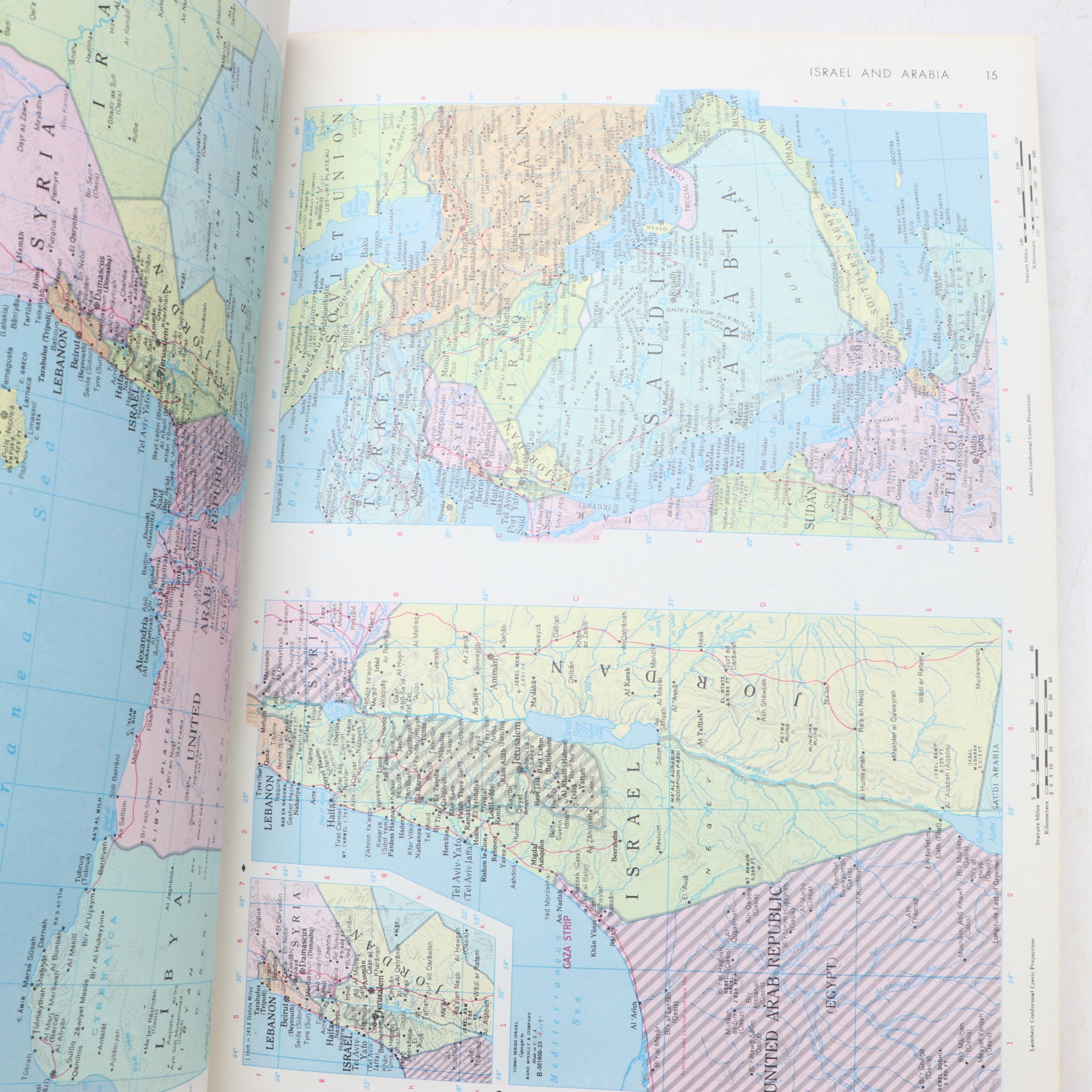 "Webster's New Twentieth Century Dictionary" with "Rand McNally World Atlas"