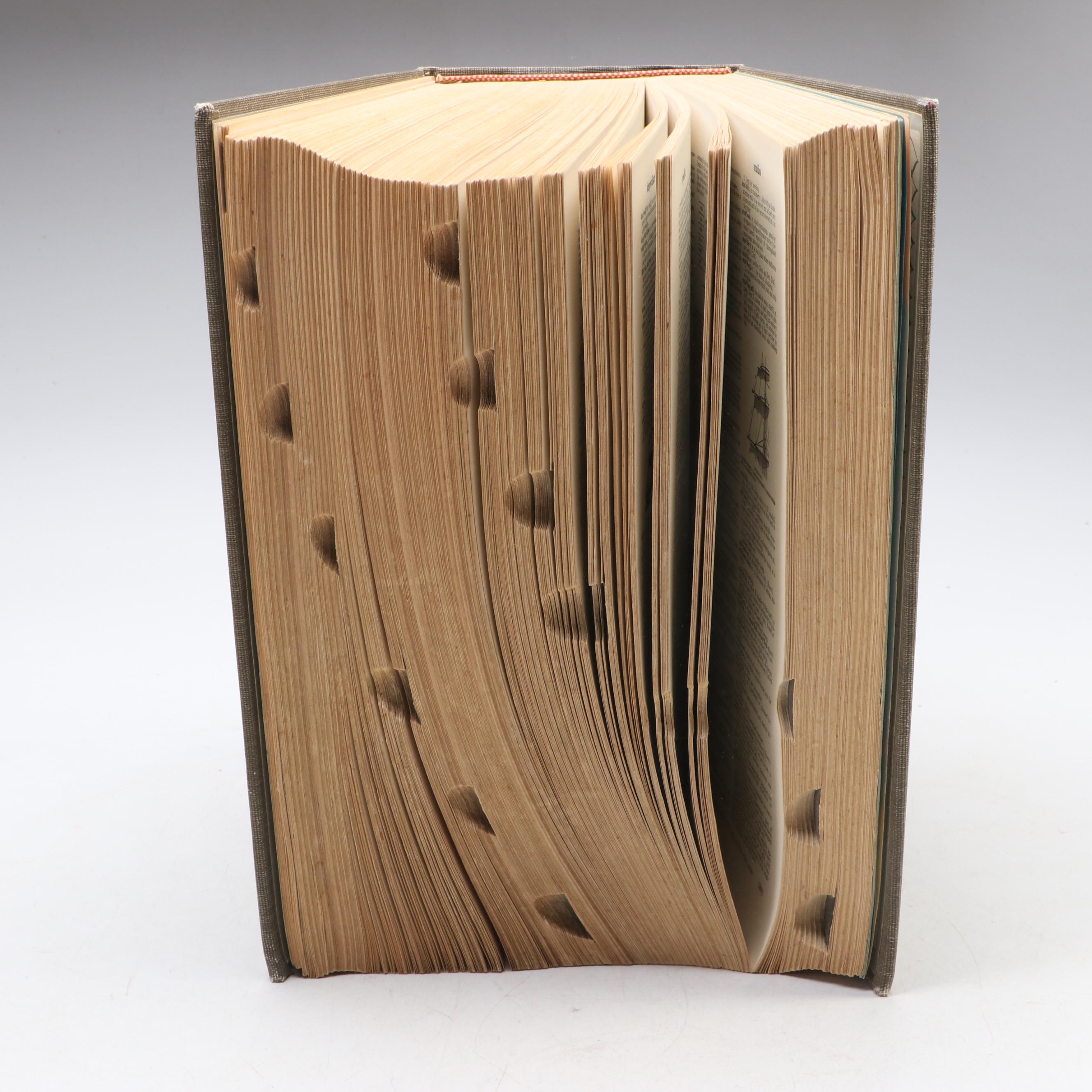 "Webster's New Twentieth Century Dictionary" with "Rand McNally World Atlas"