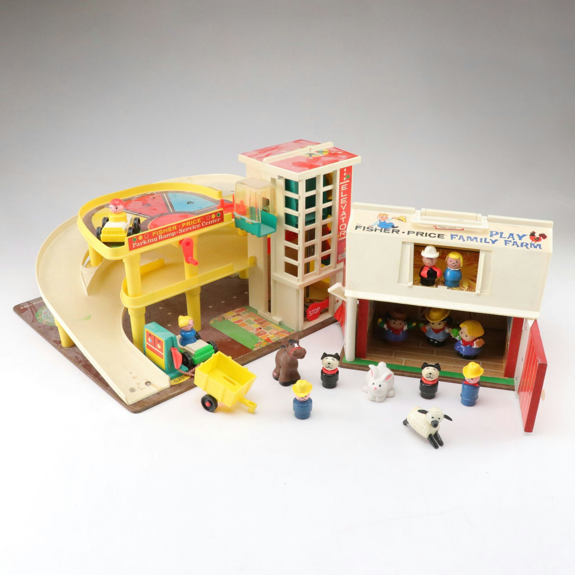 Fisher-Price "Family Farm" and "Parking Ramp Service Center" Play Sets