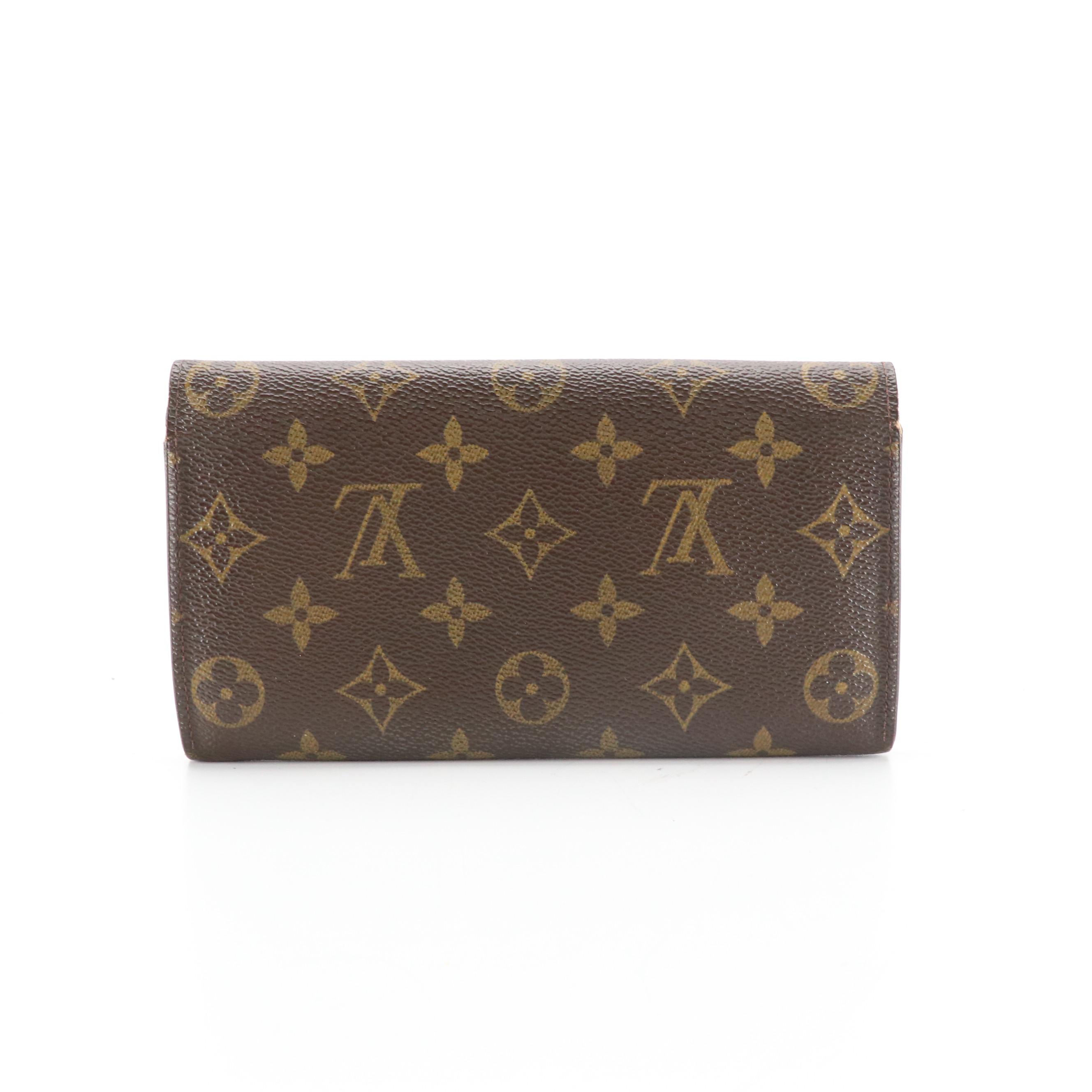 Louis Vuitton Flap Wallet in Monogram Coated Canvas