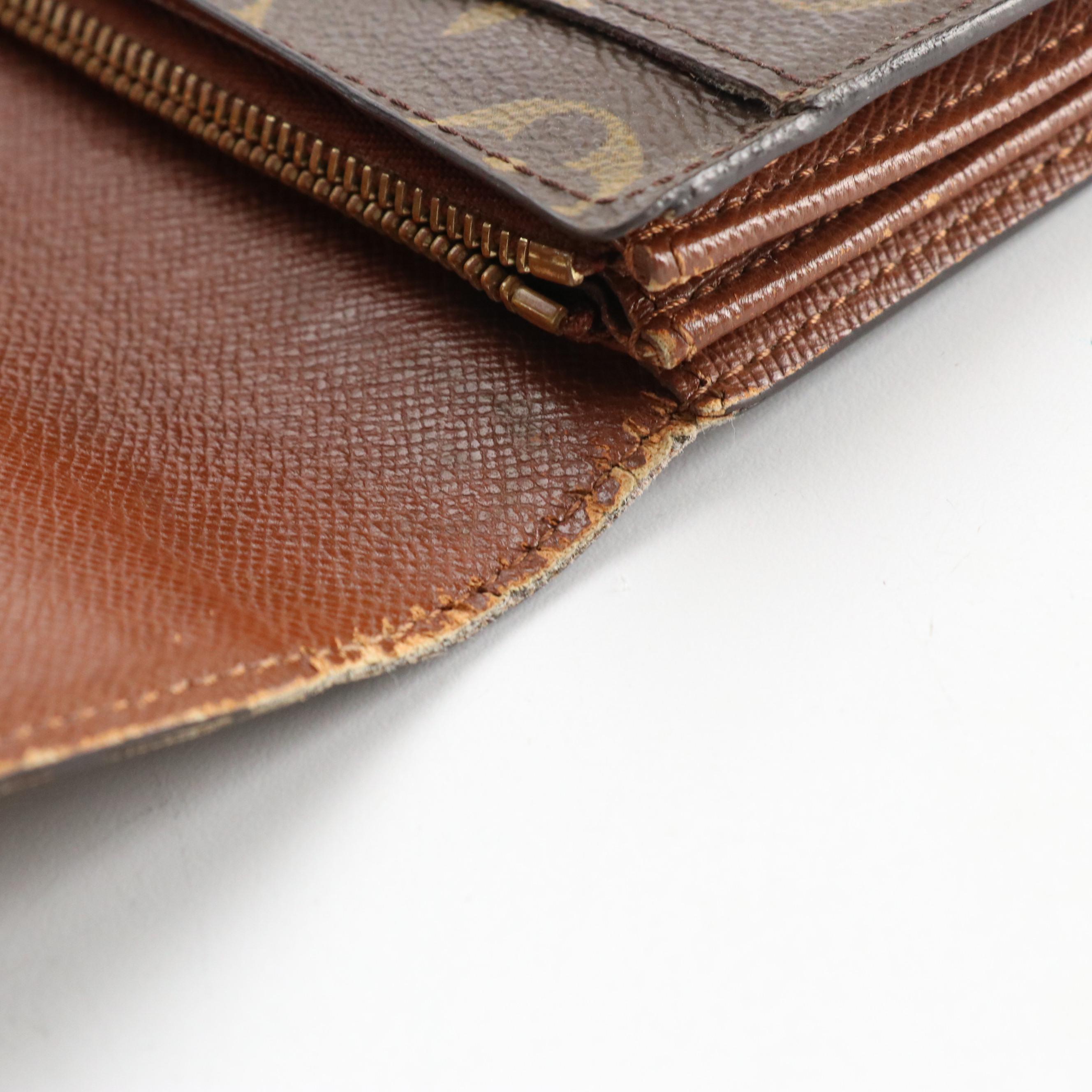 Louis Vuitton Flap Wallet in Monogram Coated Canvas