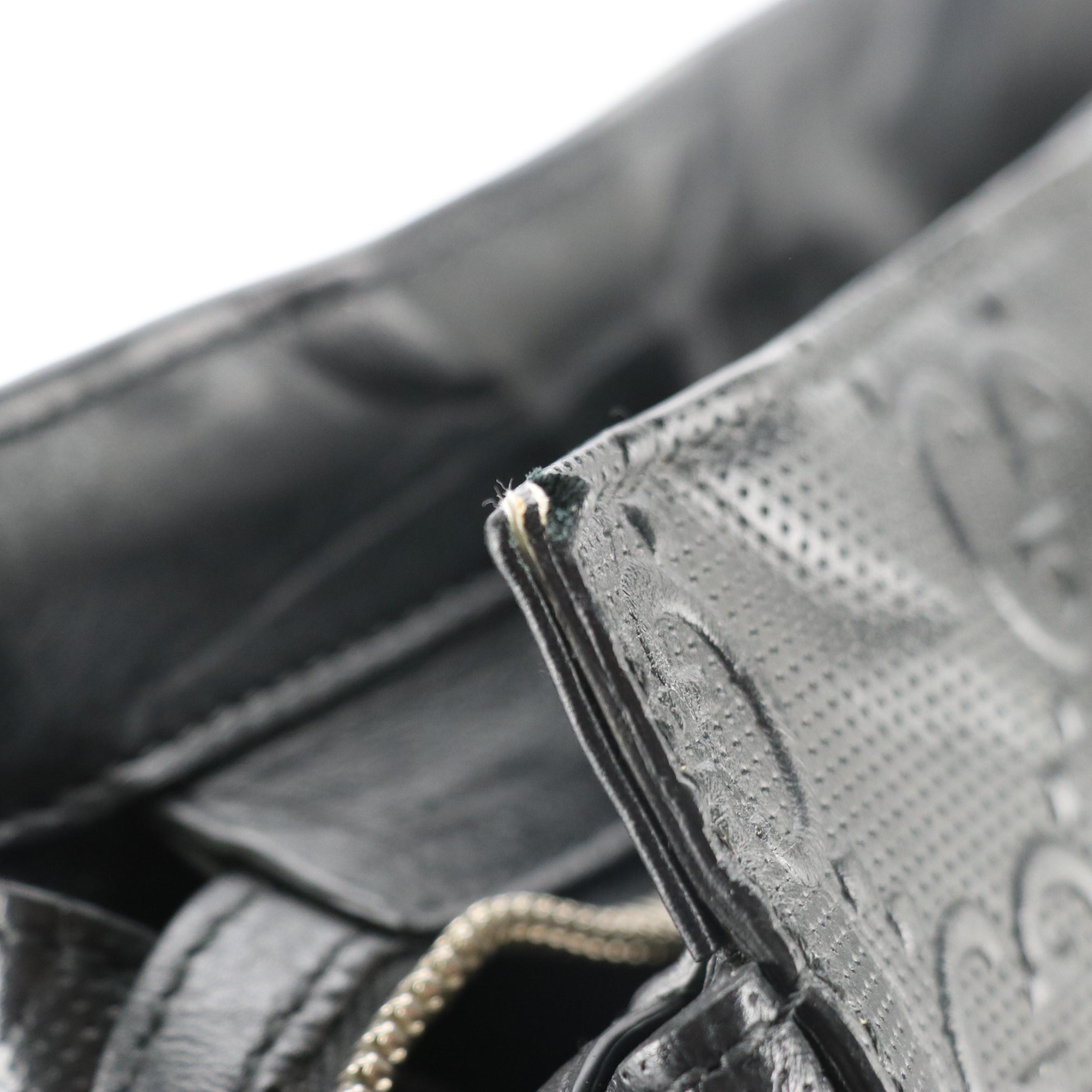 Gucci Buckle Strap Tote in Black GG Embossed and Perforated Calfskin Leather