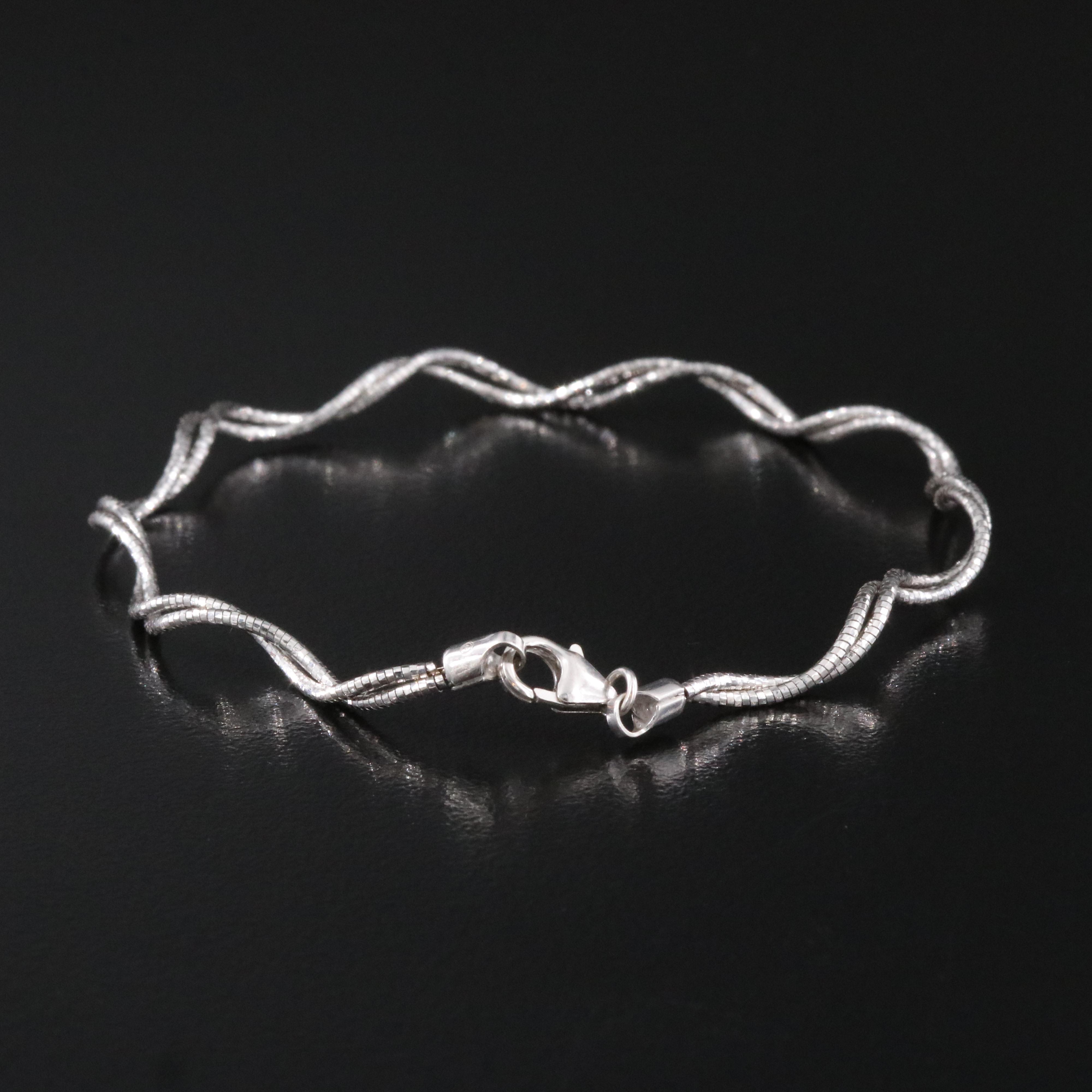 14K Twisted Flexible Bangle Bracelet
