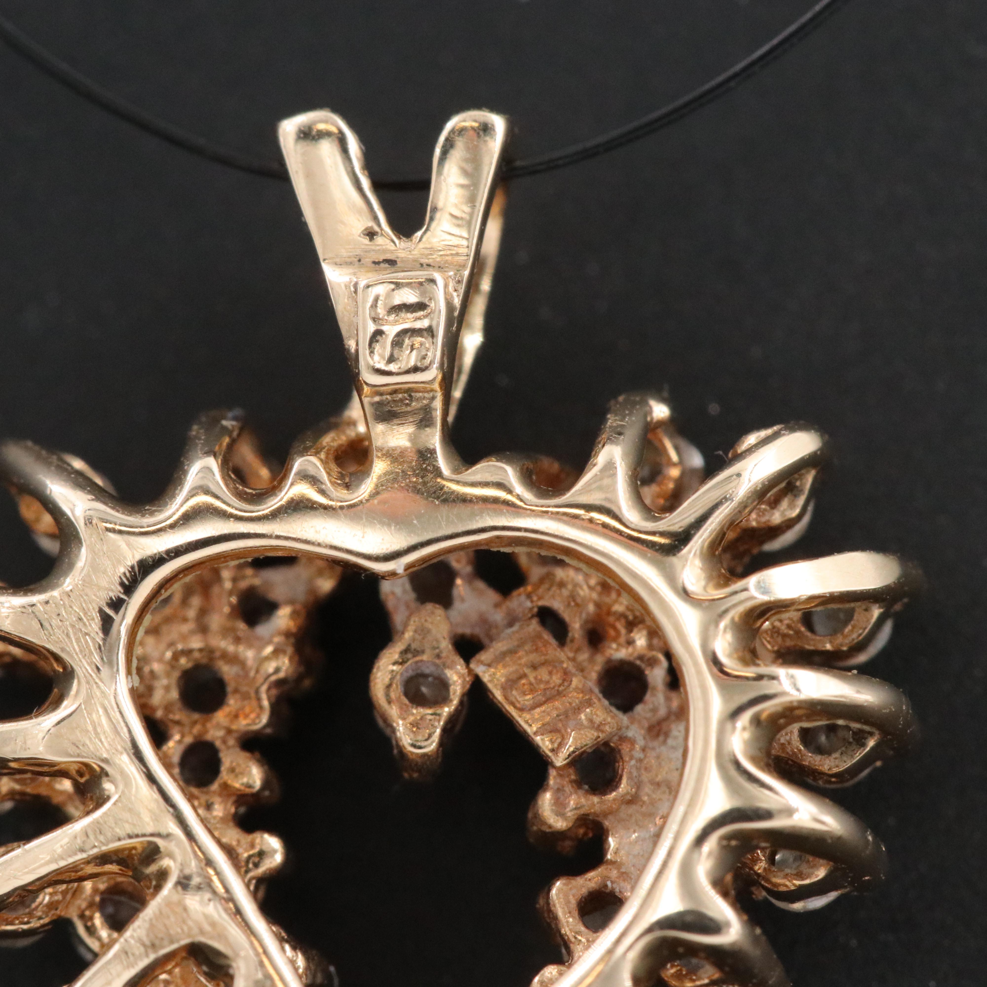 10K 0.51 CTW Diamond Heart Pendant