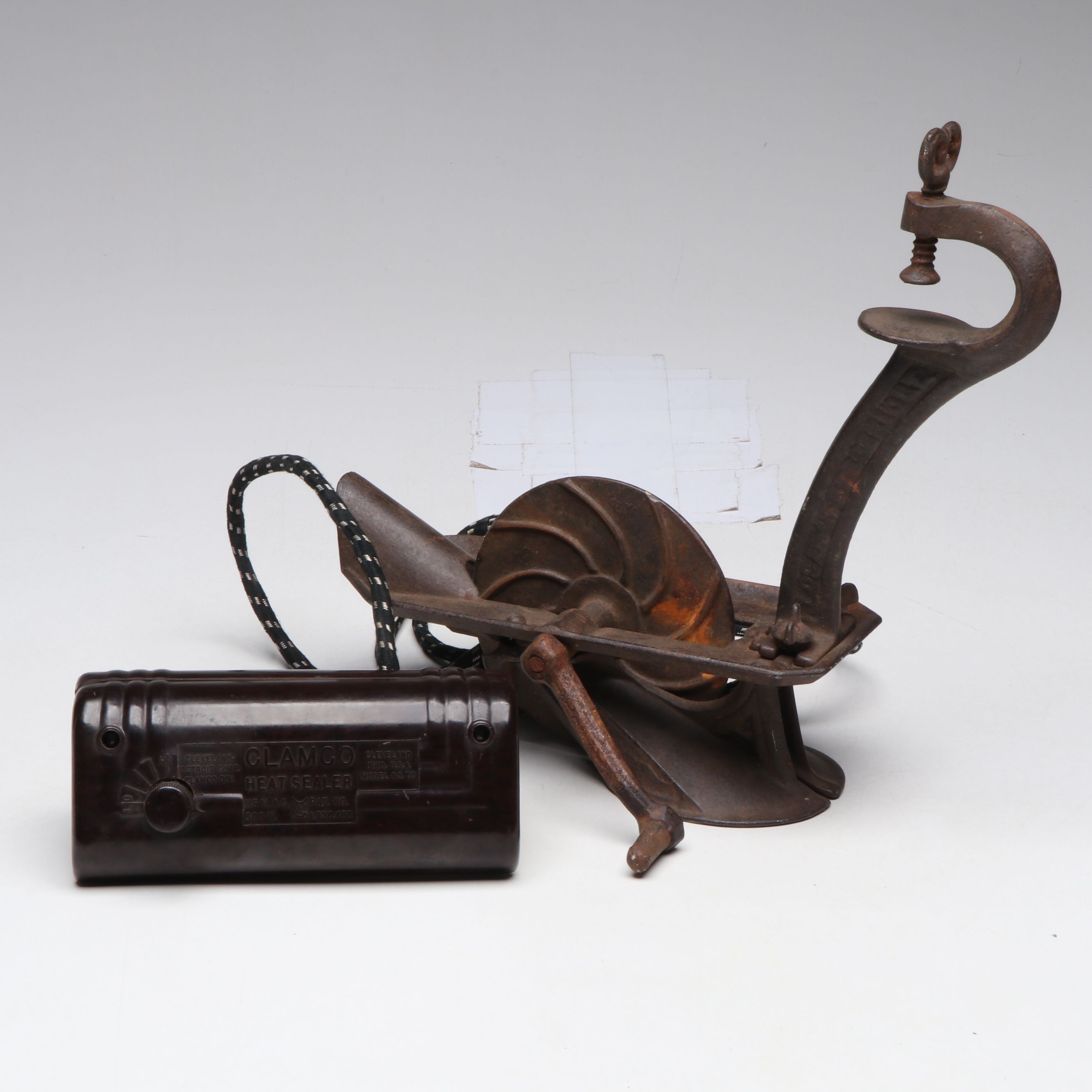 Logan and Strobridge Cast Iron Cherry Pitter with Clamco Heat Sealer