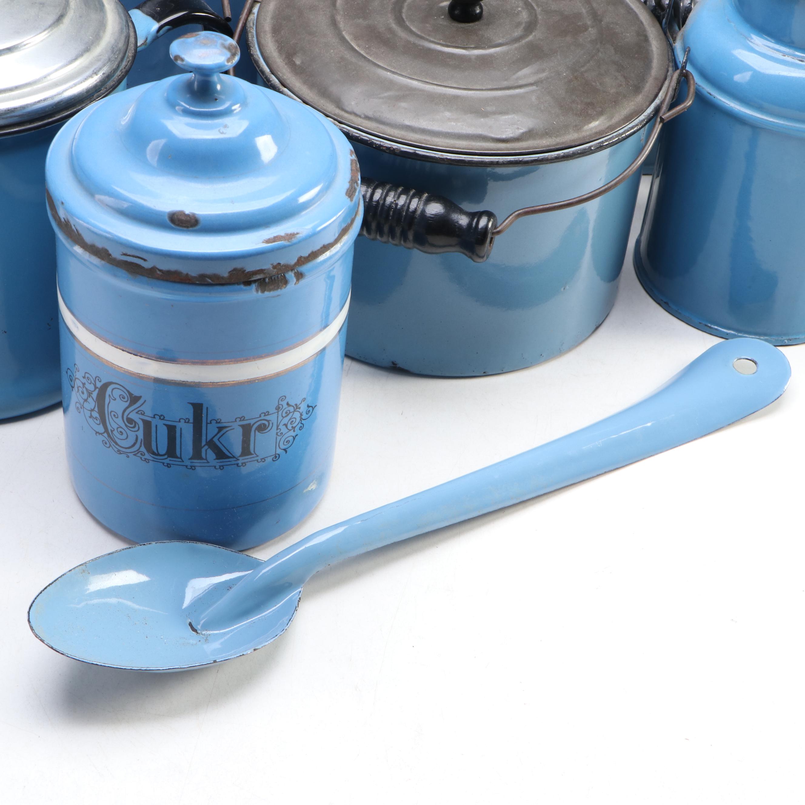 Blue Enamelware Handled Canisters and Spoon with Other Food Storage