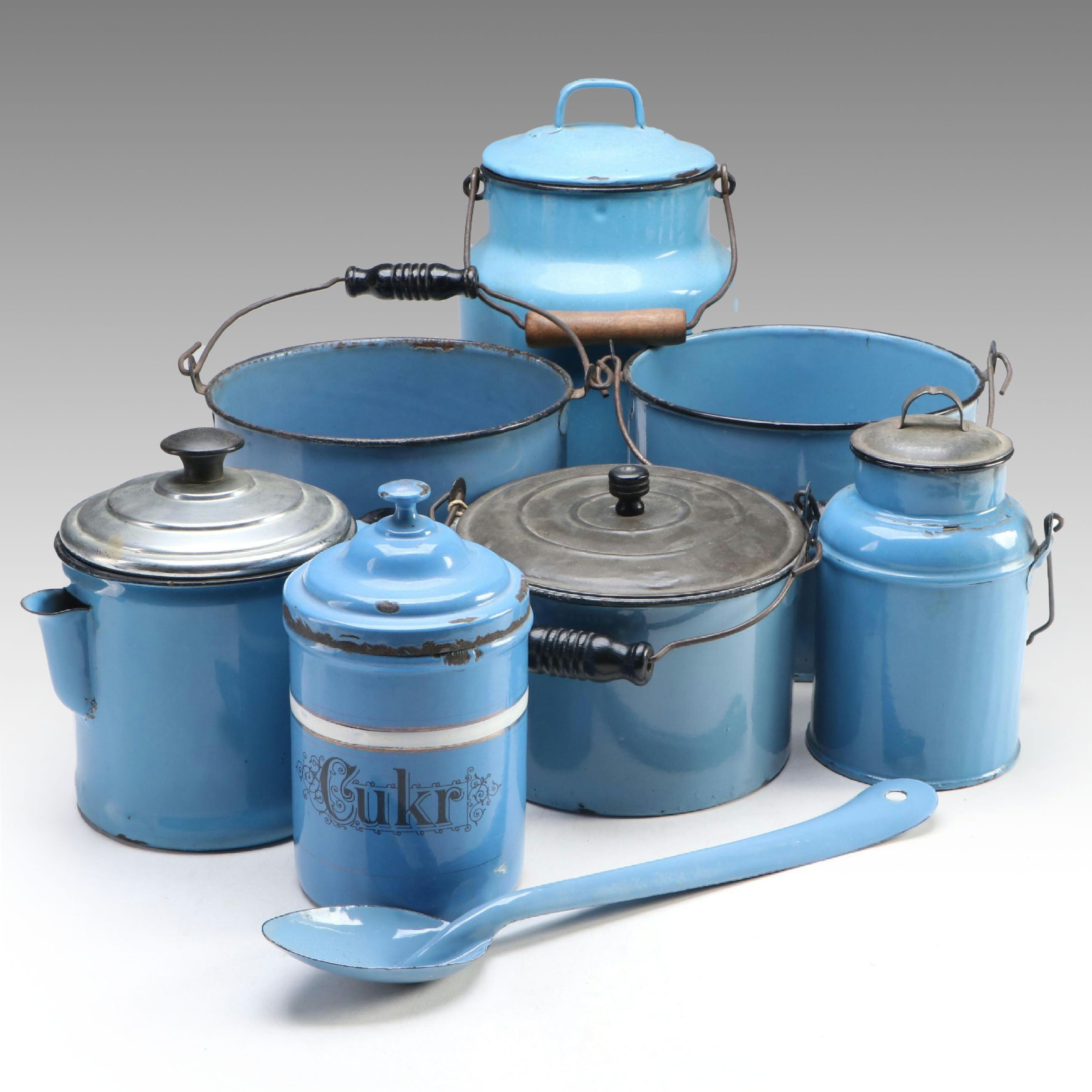 Blue Enamelware Handled Canisters and Spoon with Other Food Storage