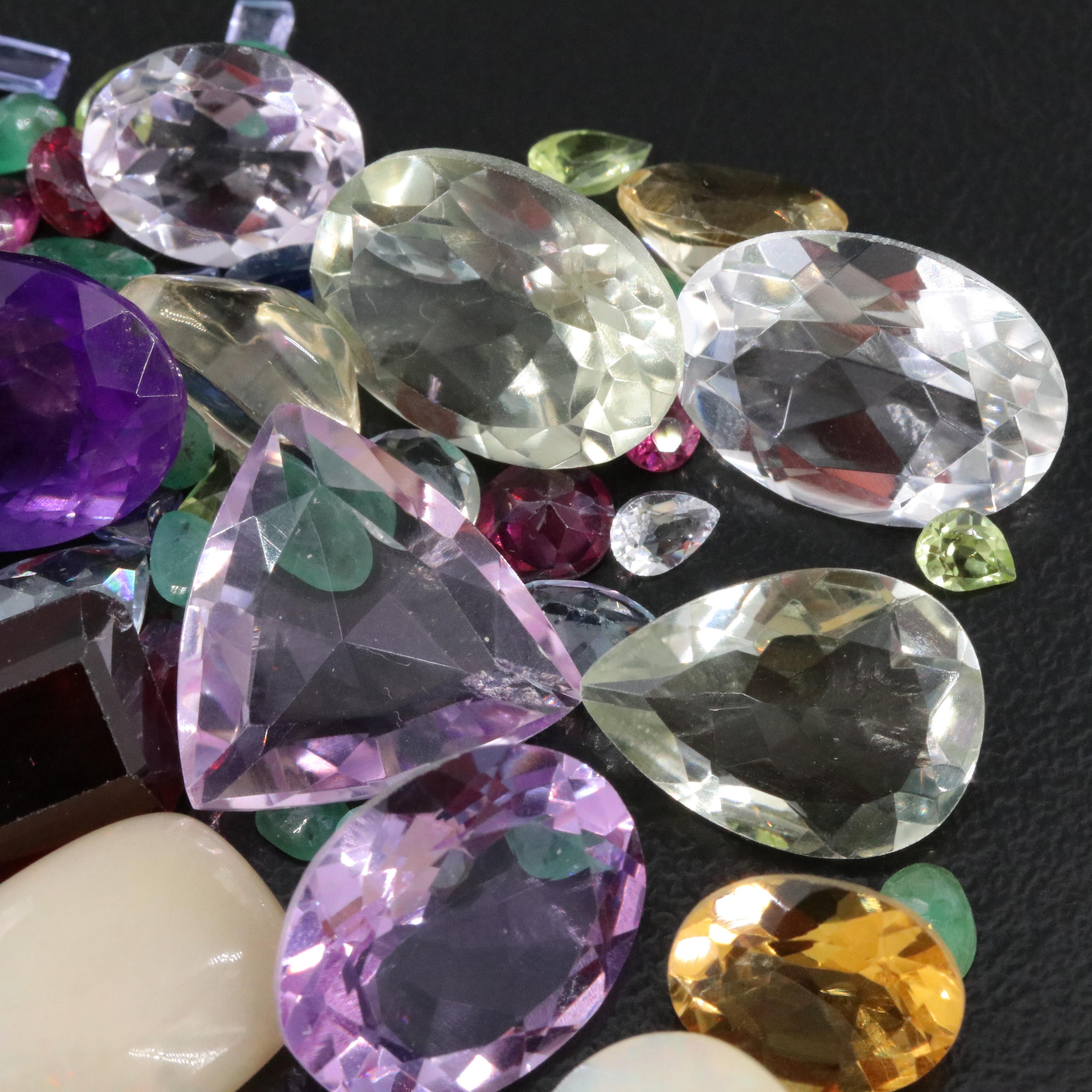 Loose 86.50 CTW Gemstone Lot Including Emerald, Citrine and Amethyst
