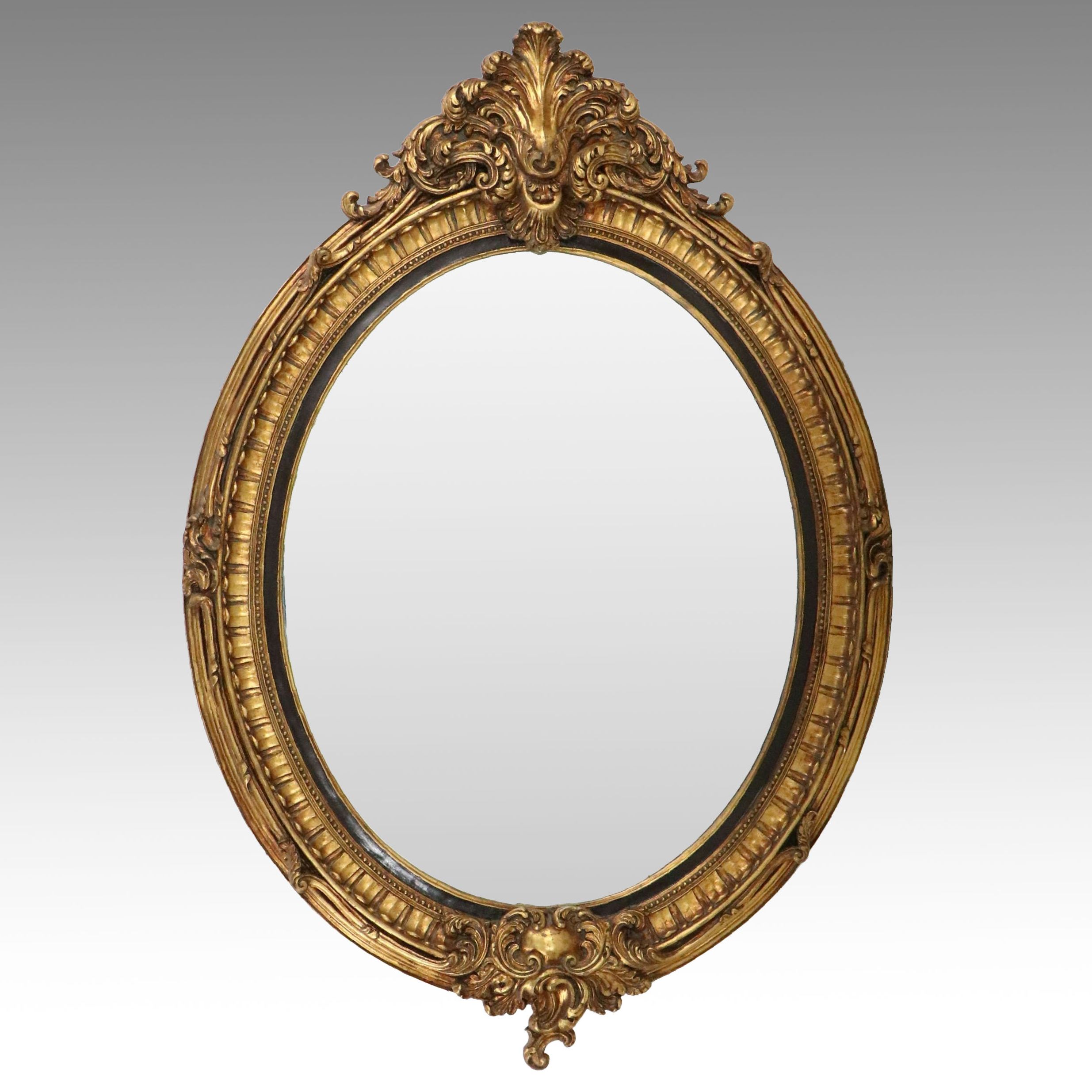 French Louis XVI Style Carved Giltwood Oval Wall Mirror, Late 19th/Early 20th C.