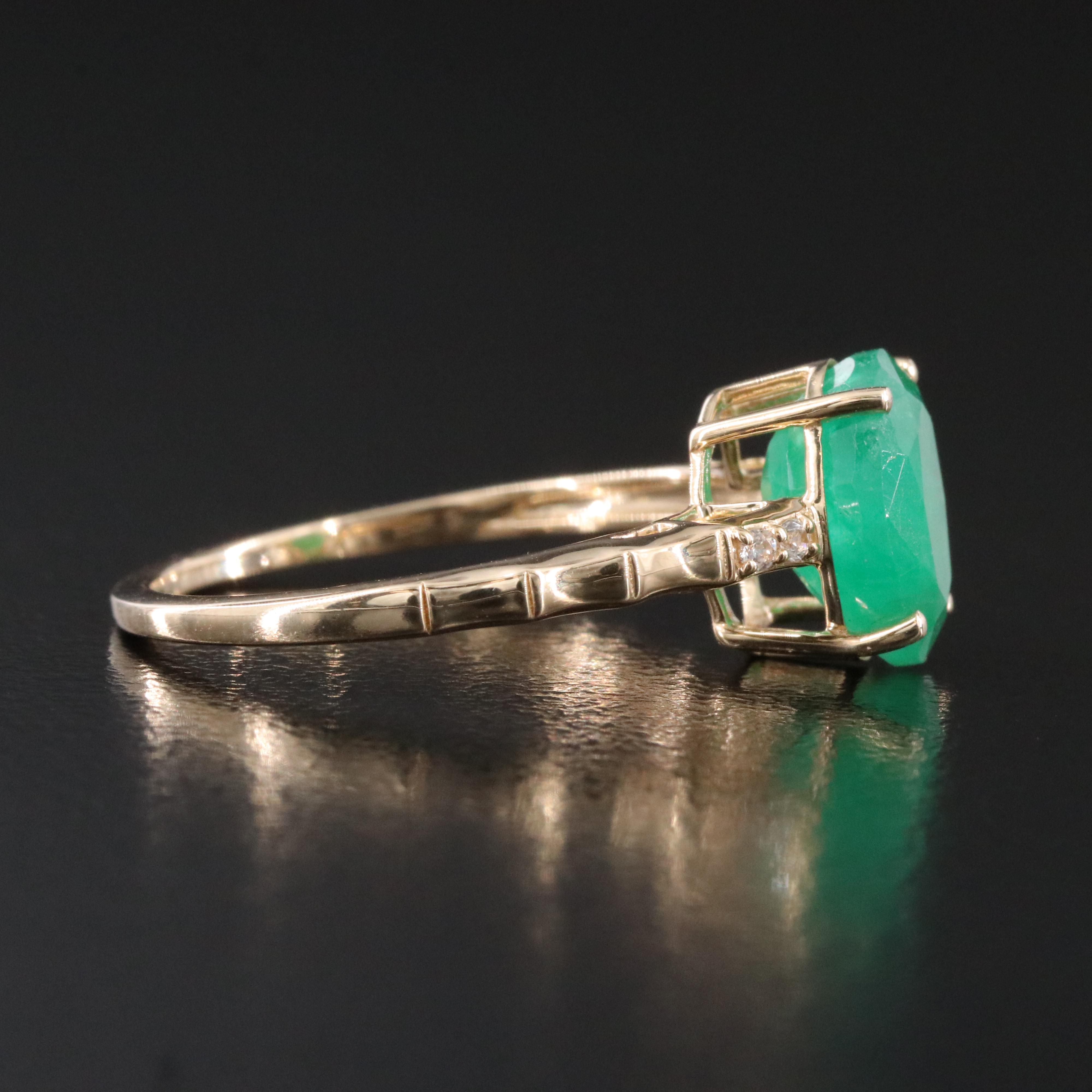 14K 1.86 CT Emerald and White Sapphire Ring