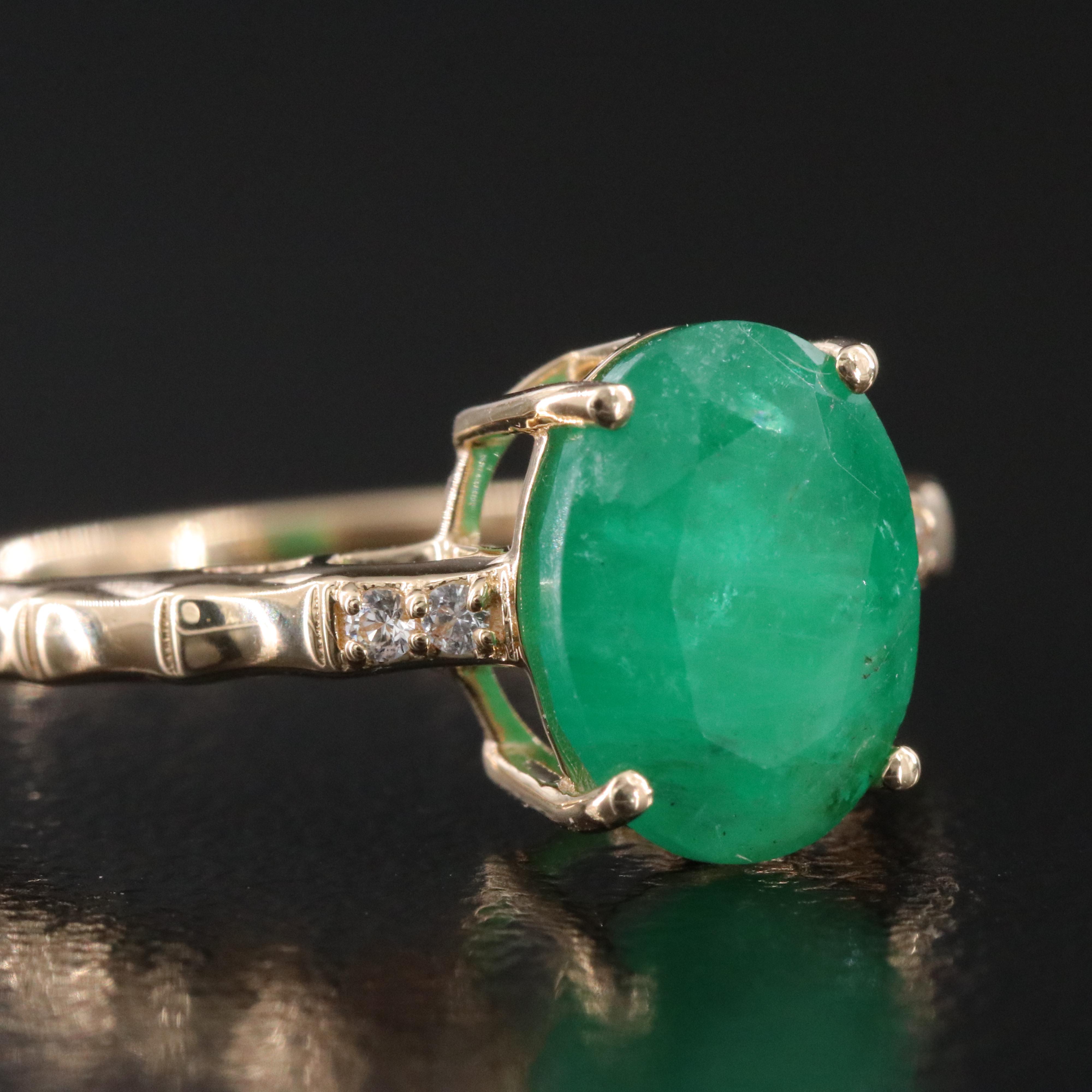 14K 1.86 CT Emerald and White Sapphire Ring