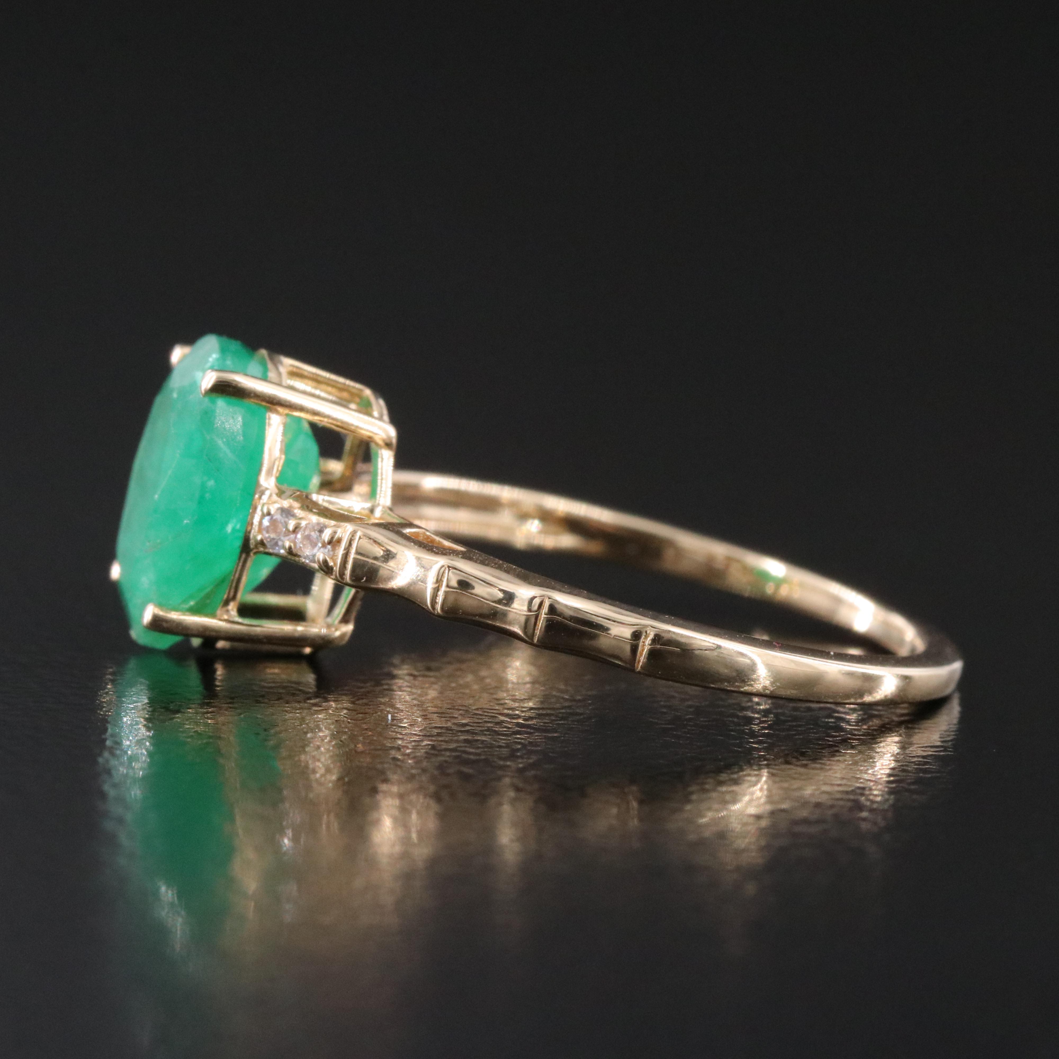 14K 1.86 CT Emerald and White Sapphire Ring