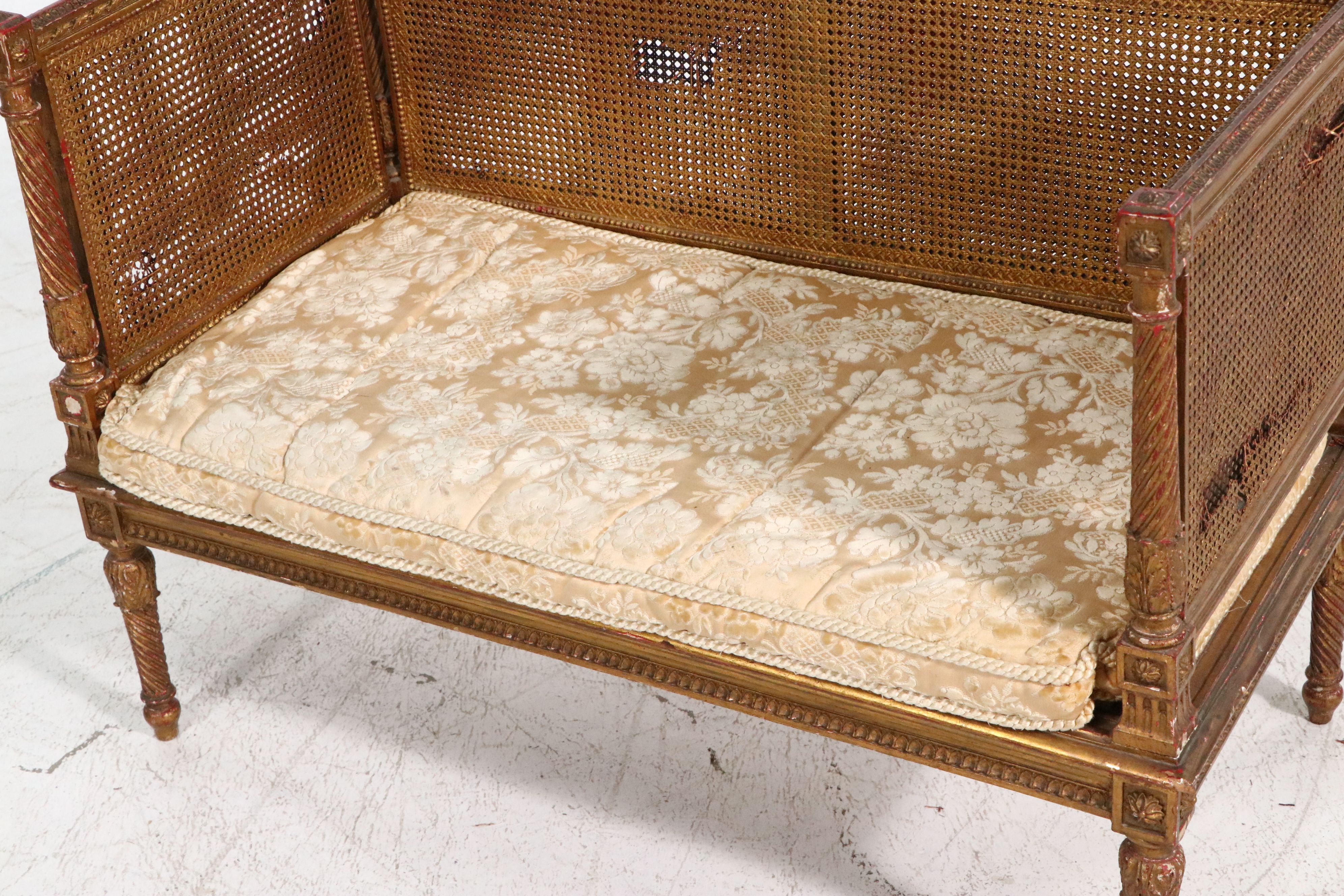 French Louis XVI Style Giltwood and Caned Canapé à Oreilles Settee, Late 19th C.