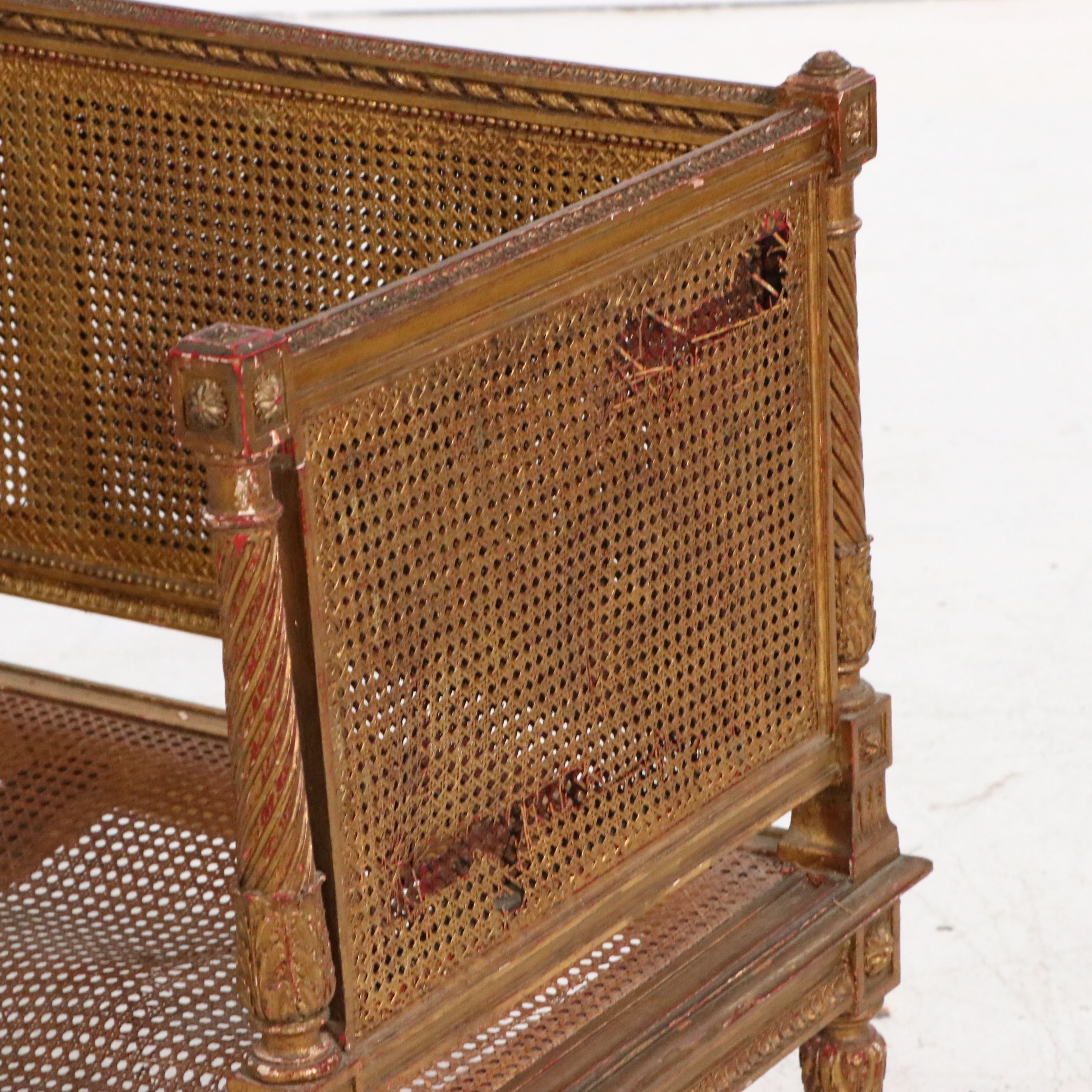 French Louis XVI Style Giltwood and Caned Canapé à Oreilles Settee, Late 19th C.