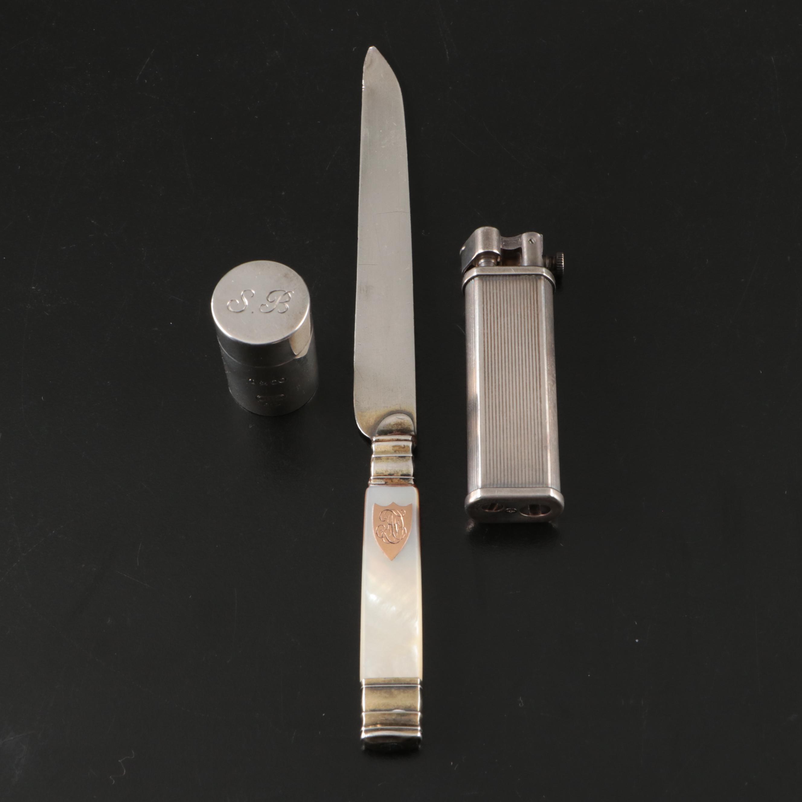 Tiffany & Co. Sterling Pill Case, Dunhill Sylphide Lighter and MOP Letter Opener