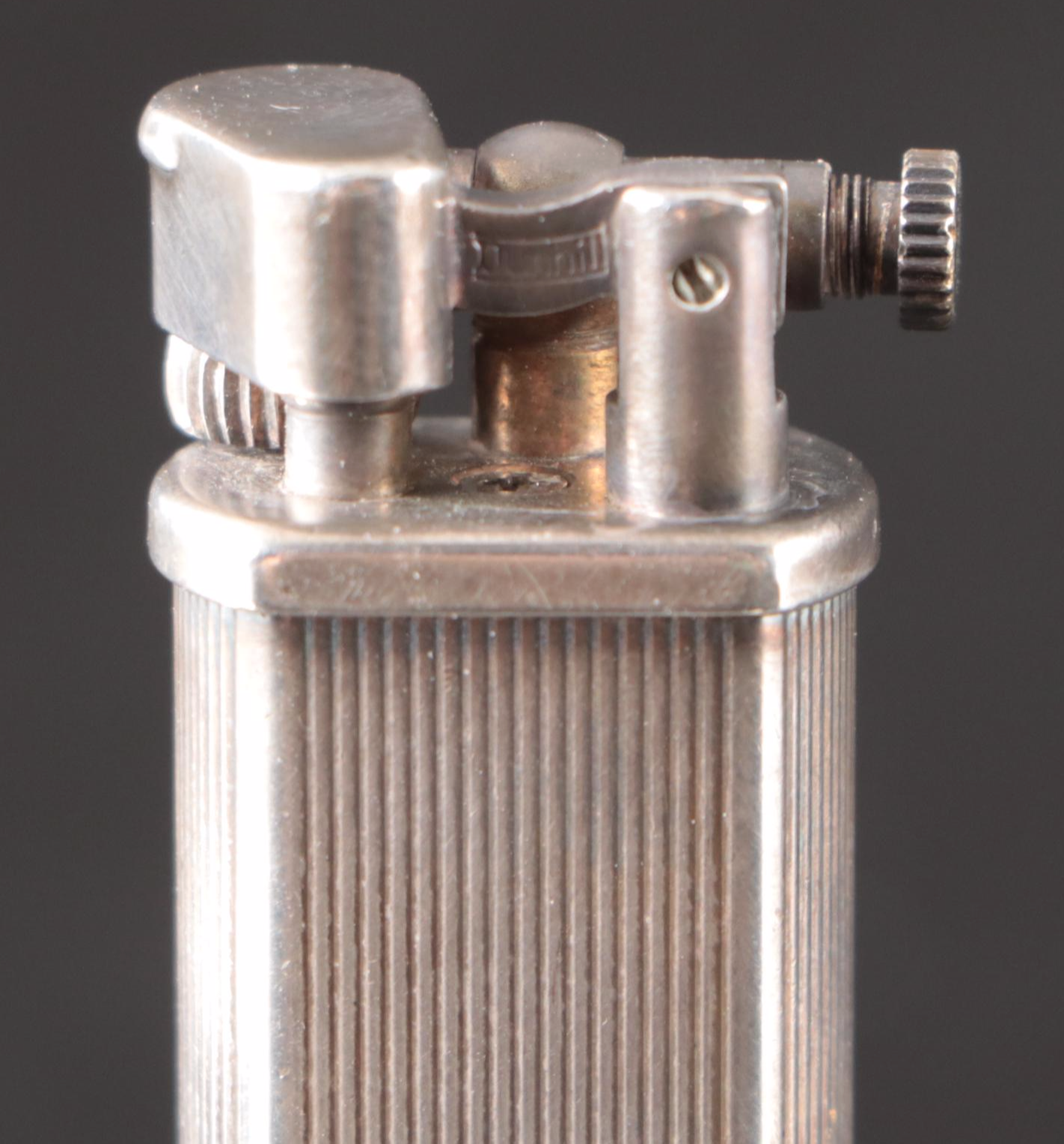 Tiffany & Co. Sterling Pill Case, Dunhill Sylphide Lighter and MOP Letter Opener