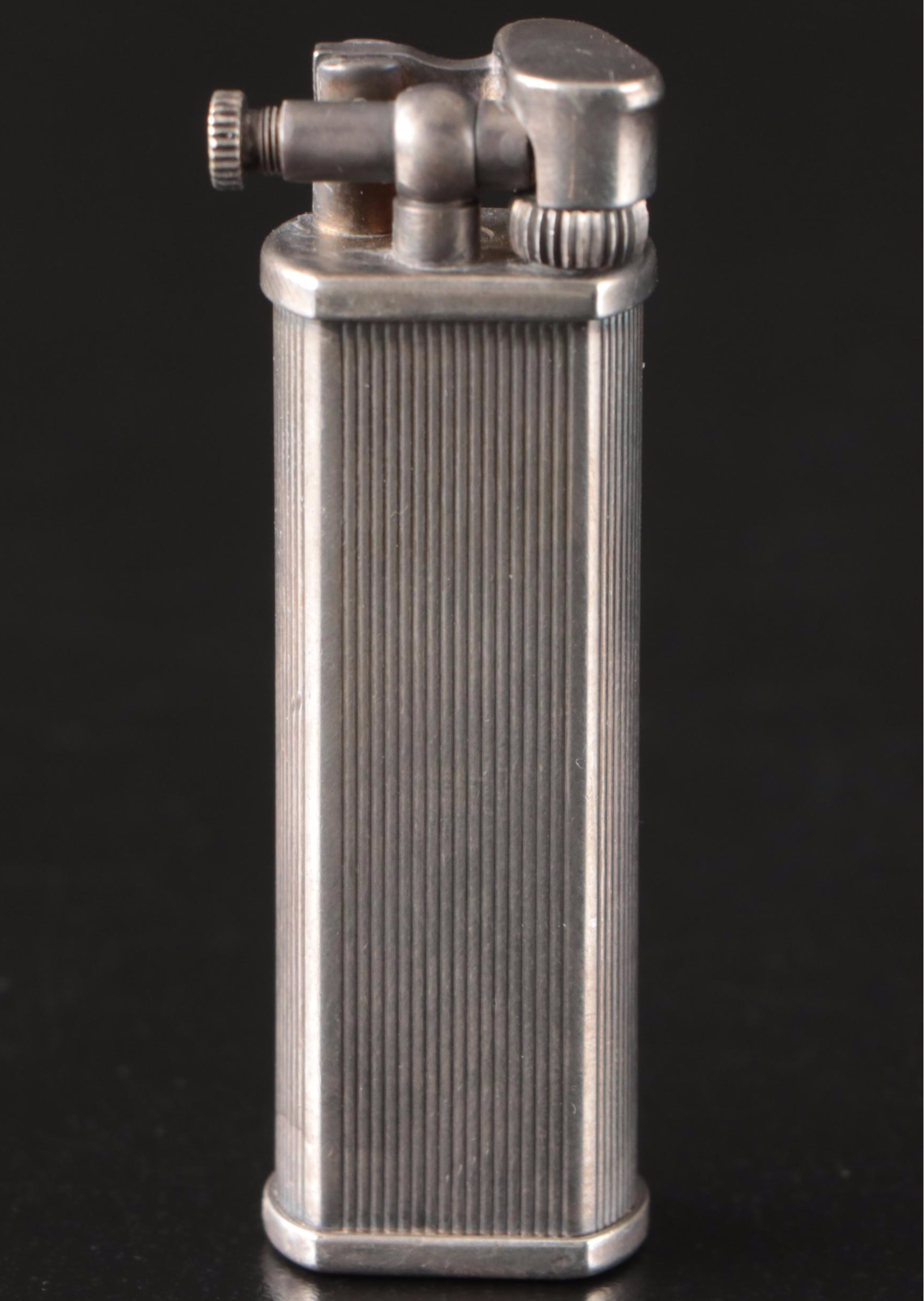 Tiffany & Co. Sterling Pill Case, Dunhill Sylphide Lighter and MOP Letter Opener