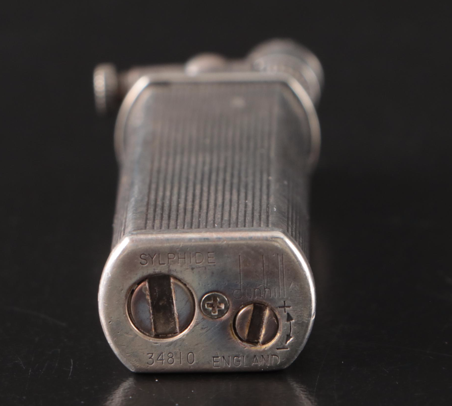 Tiffany & Co. Sterling Pill Case, Dunhill Sylphide Lighter and MOP Letter Opener